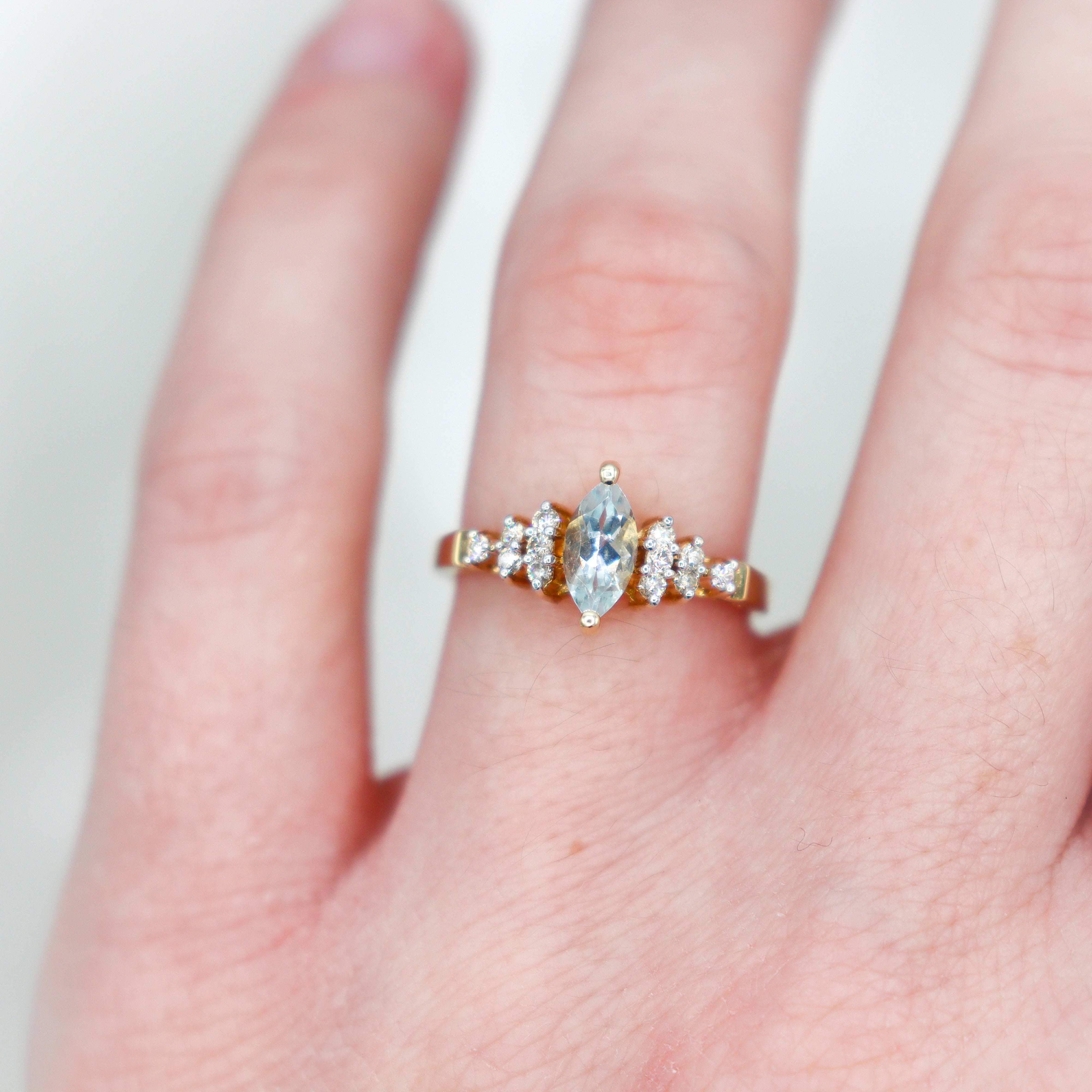 Estate Collection: 14K Yellow Gold Light Blue Marquise-Cut Gemstone & Diamond Ring