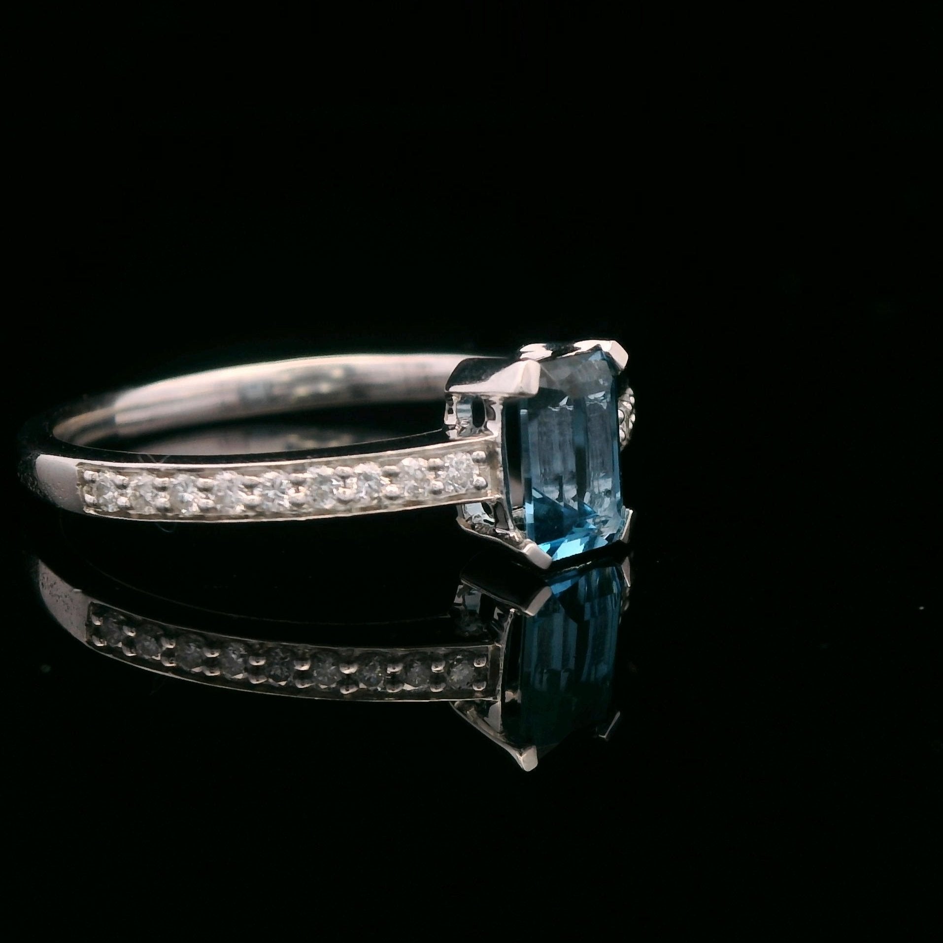 10k White Gold 1/6 CTW Diamond 3/4 CT London Blue Topaz Ring