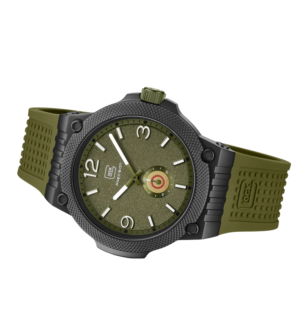 Green and black watch with detailed face on a white background