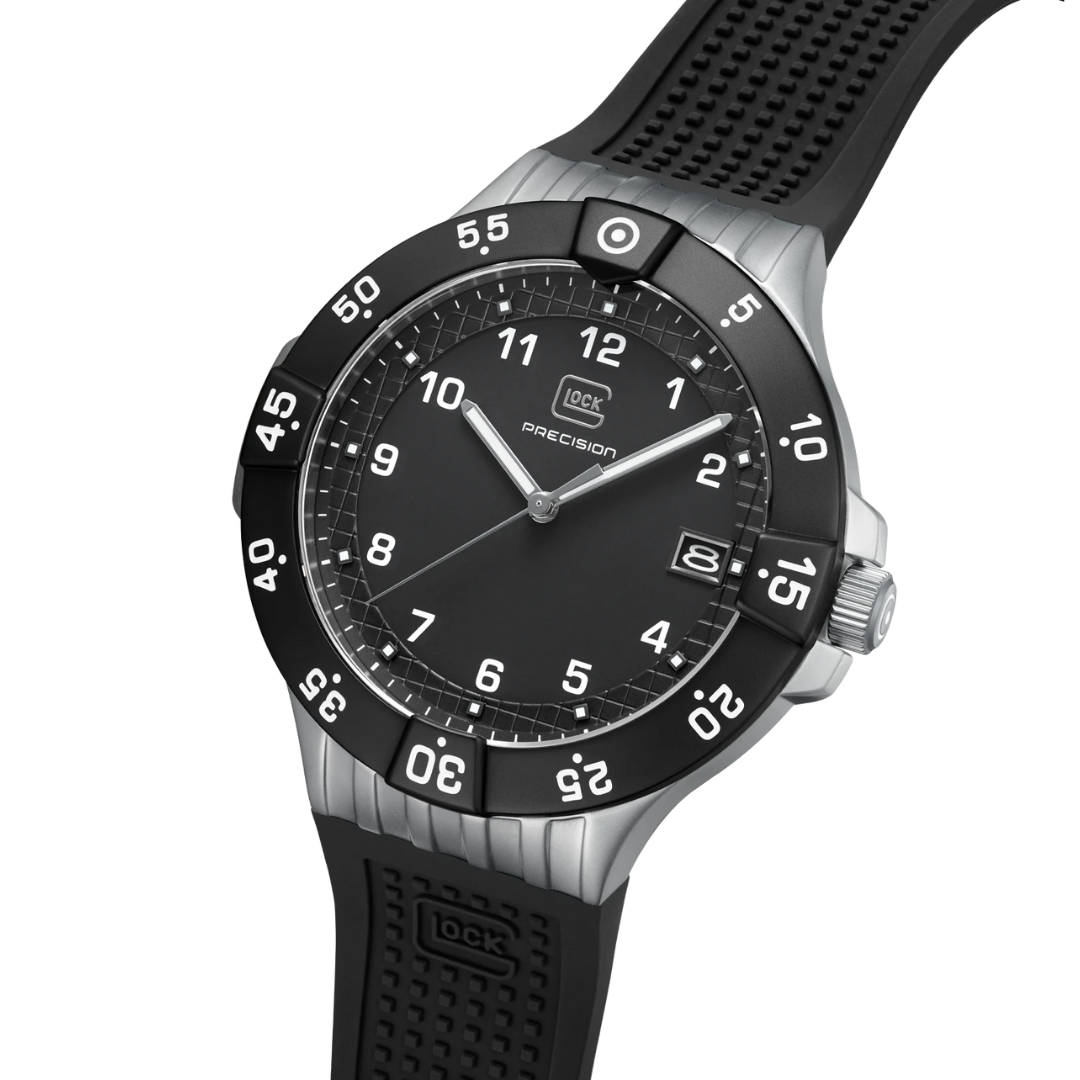 Angled front picture of GLOCK Sandblasted Silver-Tone Stainless Steel With Black Silicone Band Watch on a tranparent background.