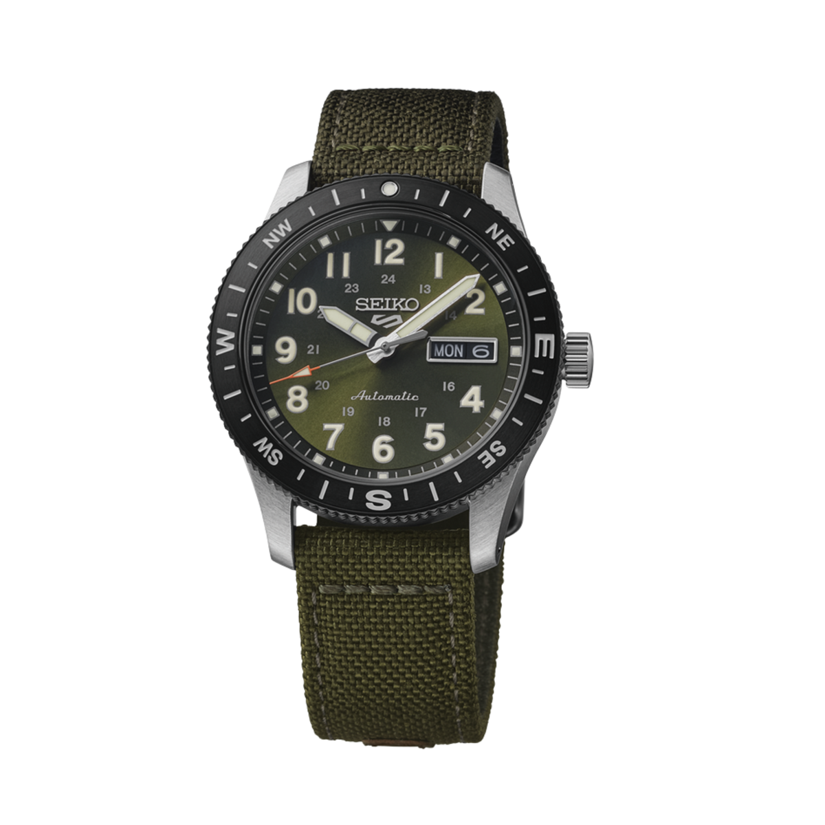 A Seiko automatic watch with an olive green fabric strap, a black rotating bezel, and a matching olive green dial with white numerals and hands.