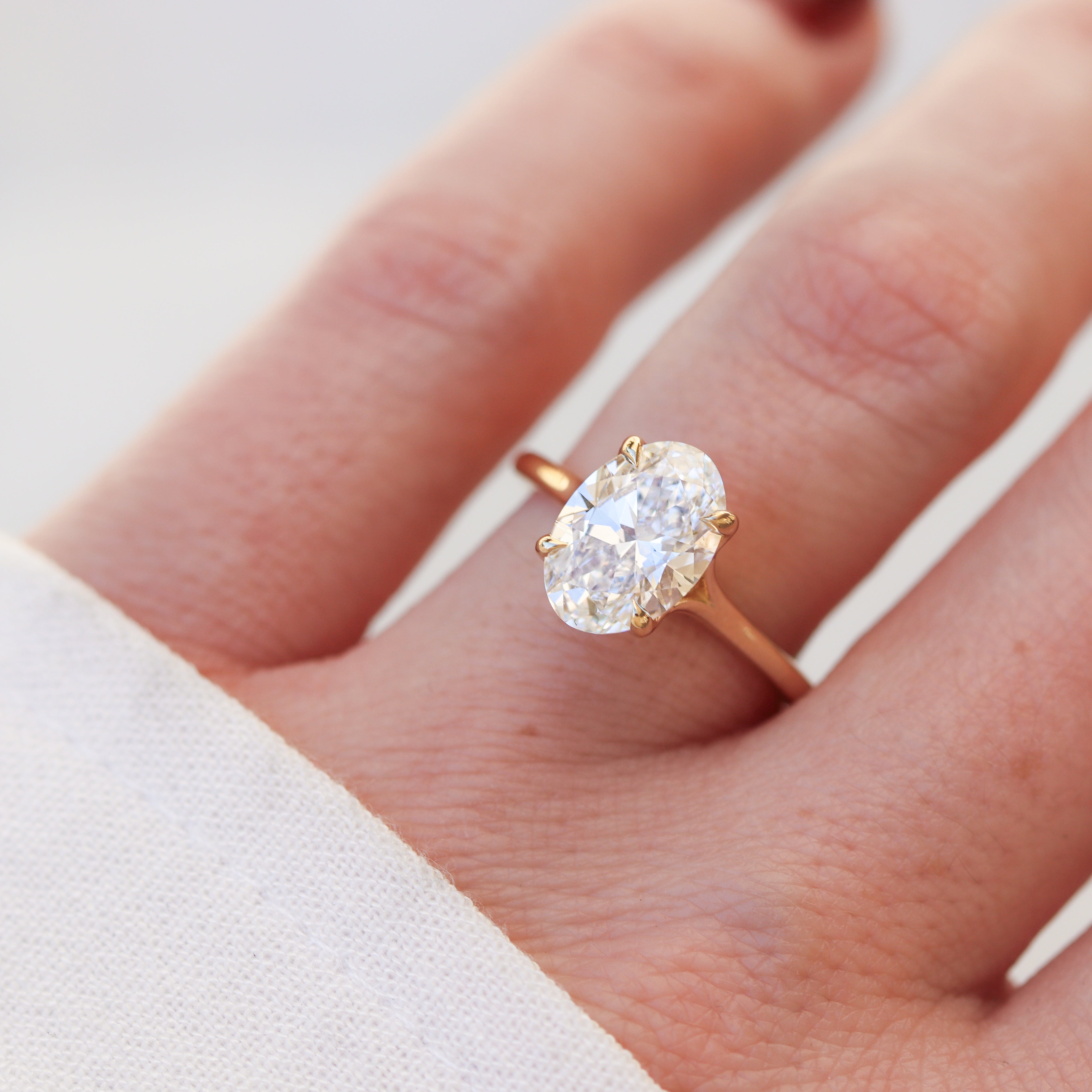 The "Margot" — 14K Yellow Gold 2.64CTW. Certified Oval-Cut Lab-Grown Diamond Cathedral-Set Engagement Ring