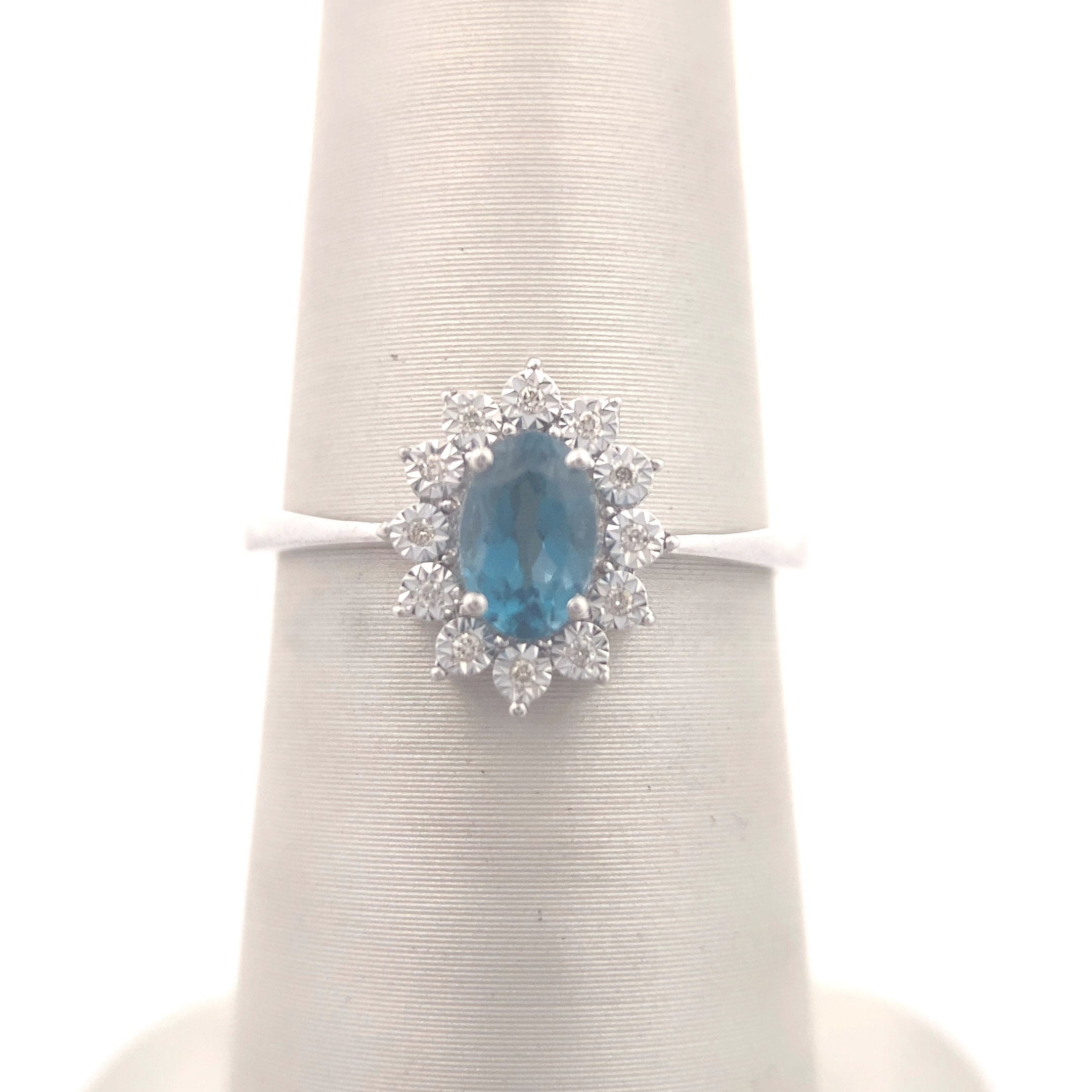 10K White Gold 1/2CT. London Blue Topaz & Radiant-Set 1/50CT. Diamond Halo Ring