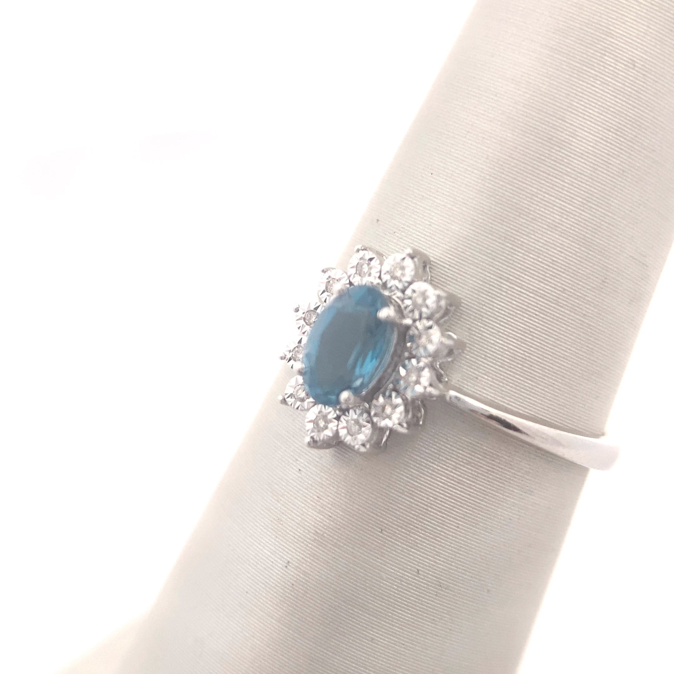 10K White Gold 1/2CT. London Blue Topaz & Radiant-Set 1/50CT. Diamond Halo Ring