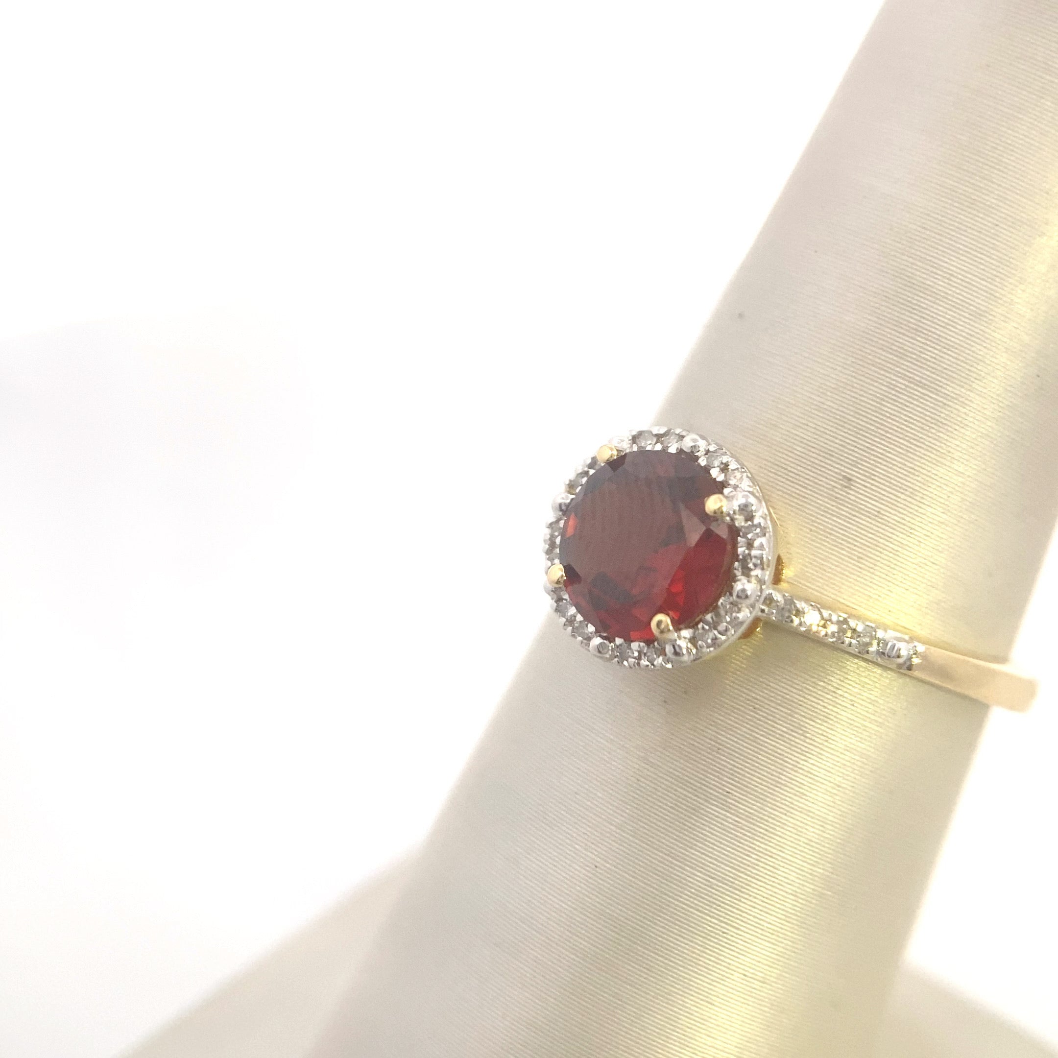 10K Yellow Gold 1-1/3CT. Garnet & 1/5CT. Diamond Halo Ring