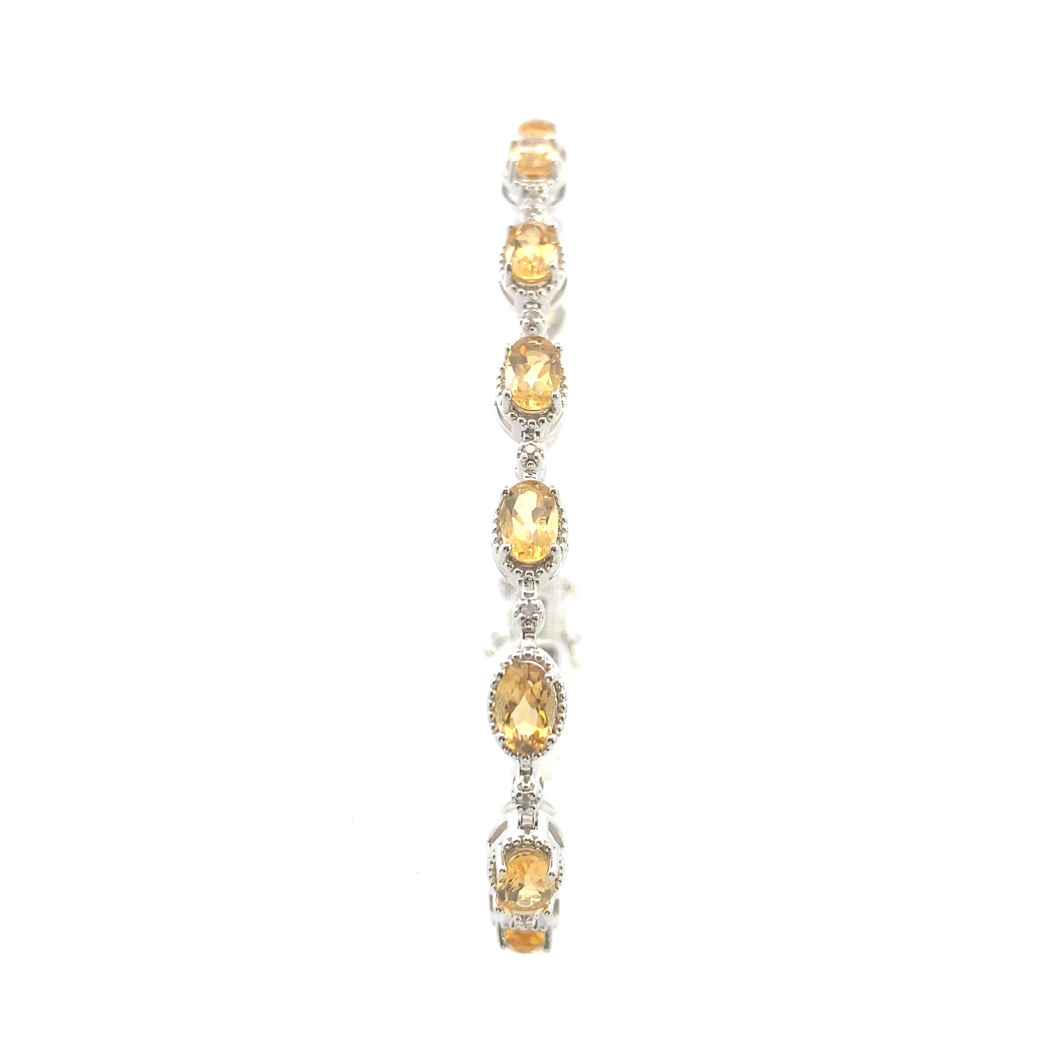 Sterling Silver 7-1/6CT. Oval-Cut Citrine & Diamond Accented Tennis Bracelet