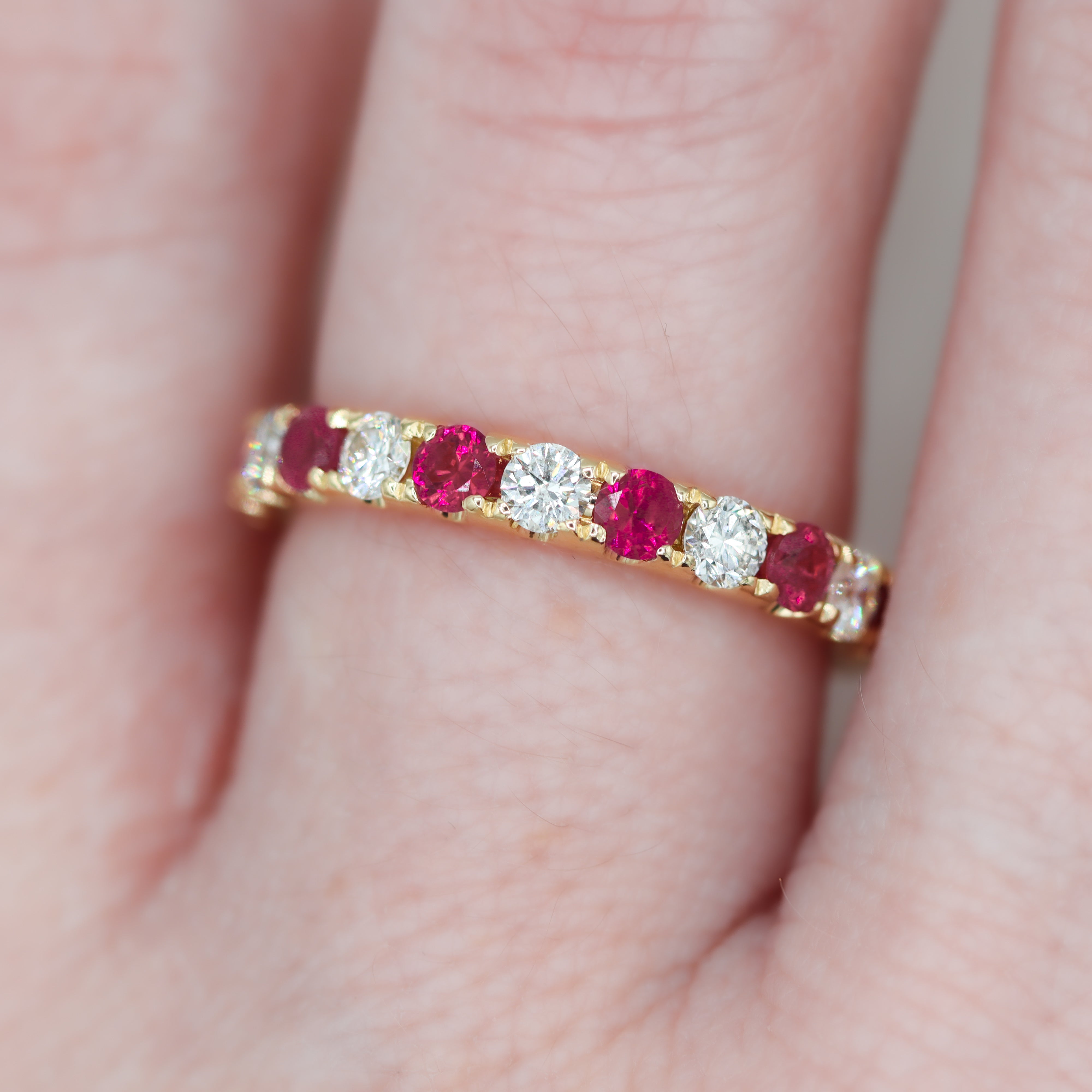 14K Yellow Gold 0.75CTW. Ruby & 0.54CTW. Diamond Alternating Stackable Band on a hand