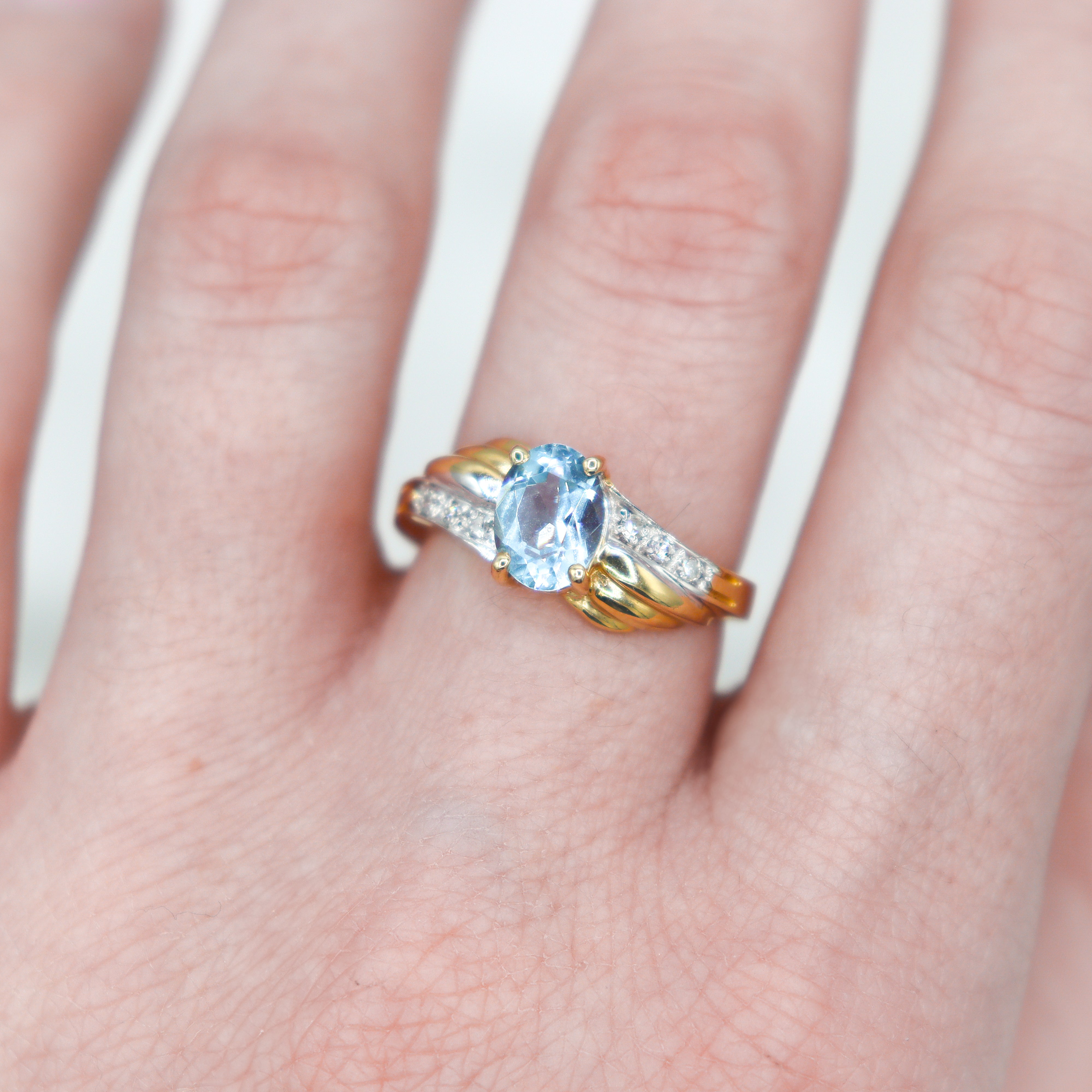 Estate Blue Oval Center with .03CTW. Diamond cocktail ring