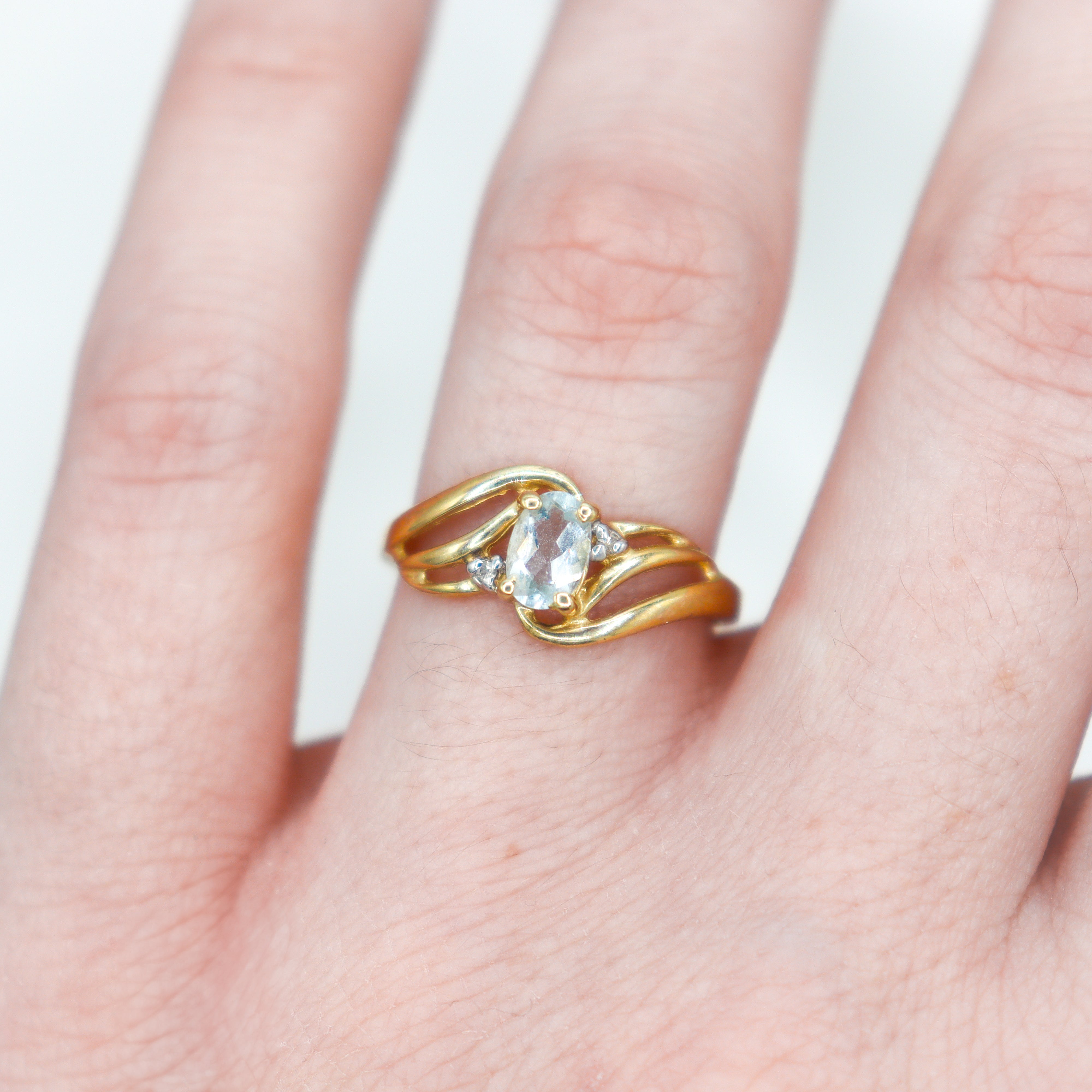 Estate 10k yellow gold aquamarine and diamond cocktail ring