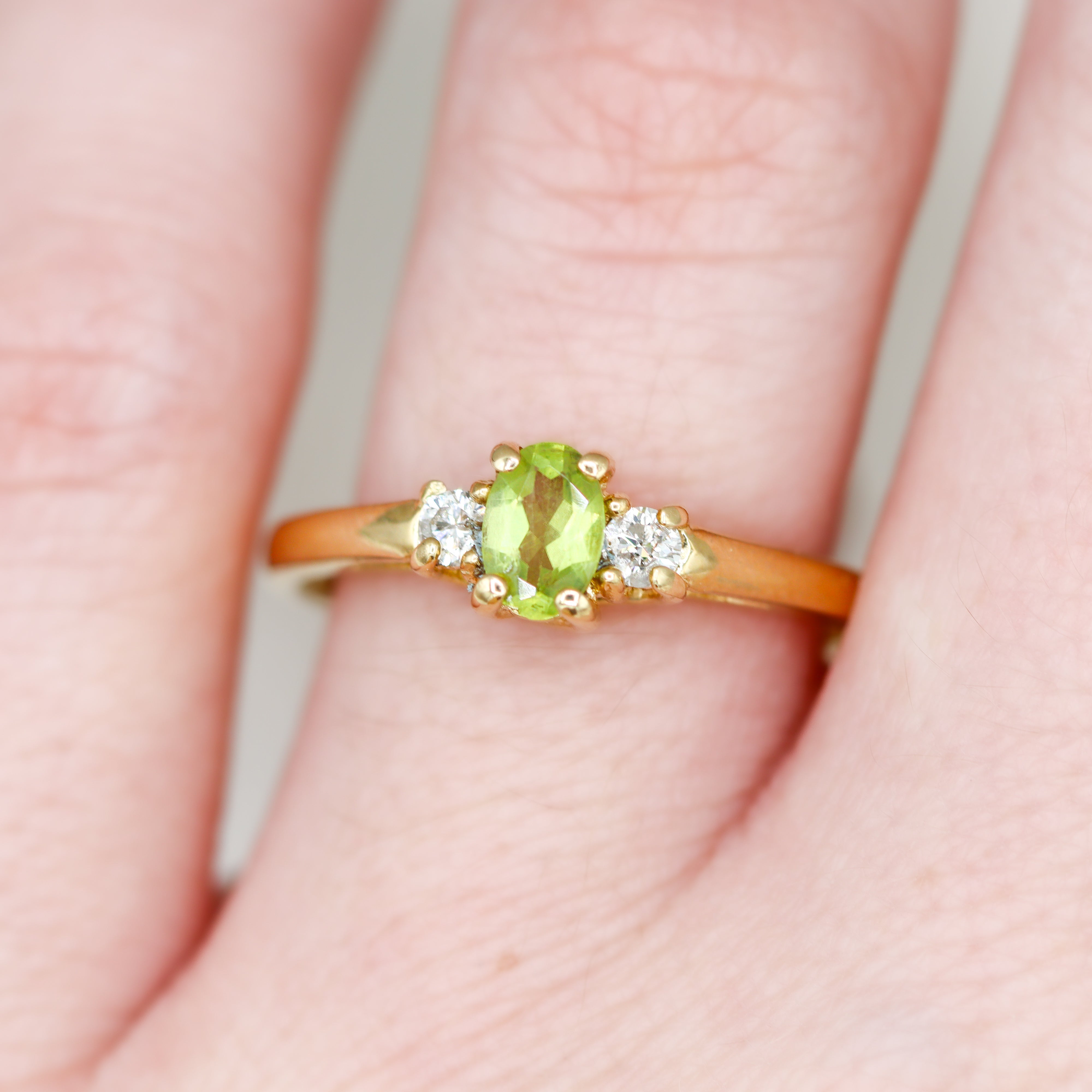 Estate Collection: 14K Yellow Gold 3-Stone Peridot & Diamond Ring