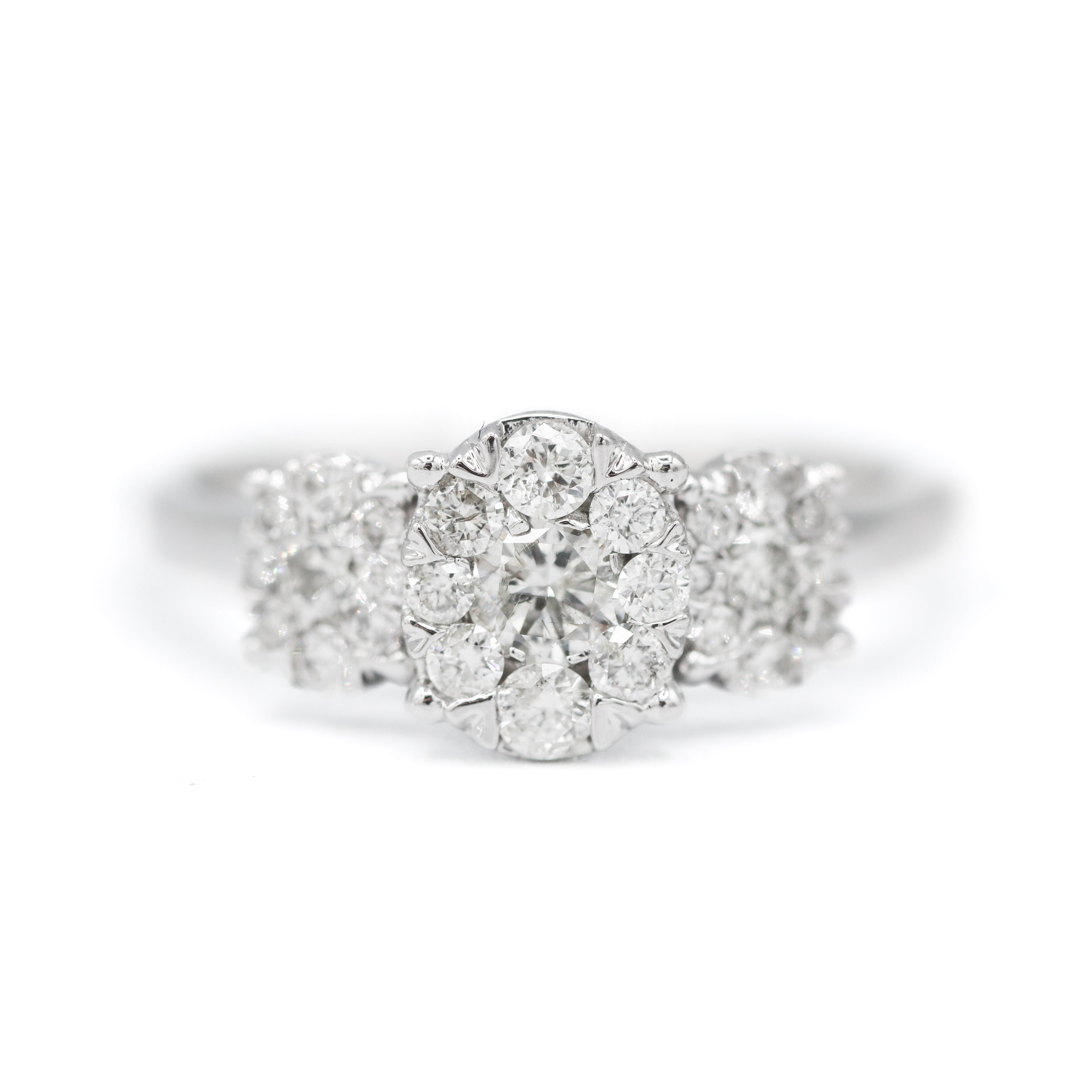 The "Laurie" — 10K White Gold 0.75CTW. Diamond 3-Stone Oval Cluster Halo Engagement Ring