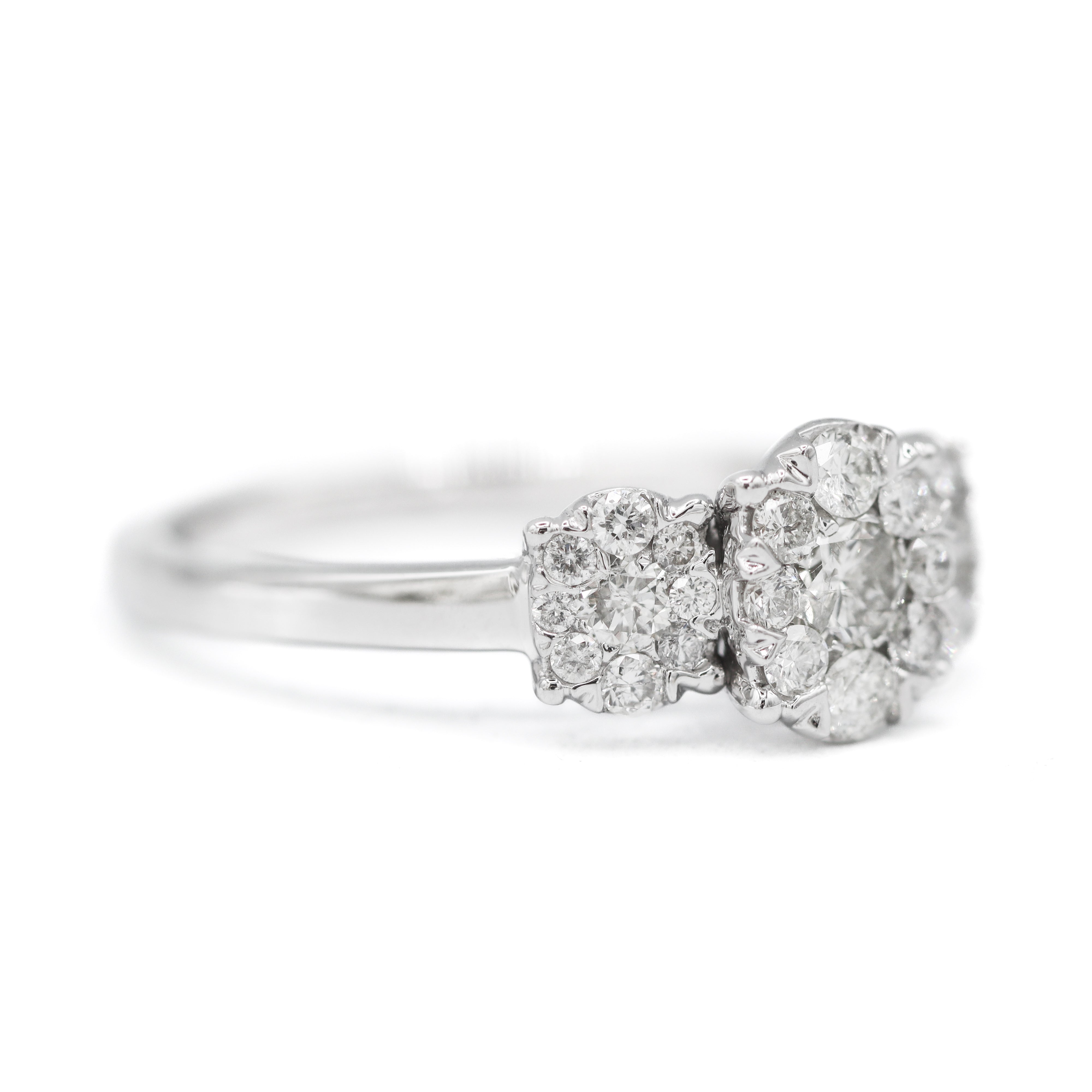 The "Laurie" — 10K White Gold 0.75CTW. Diamond 3-Stone Oval Cluster Halo Engagement Ring