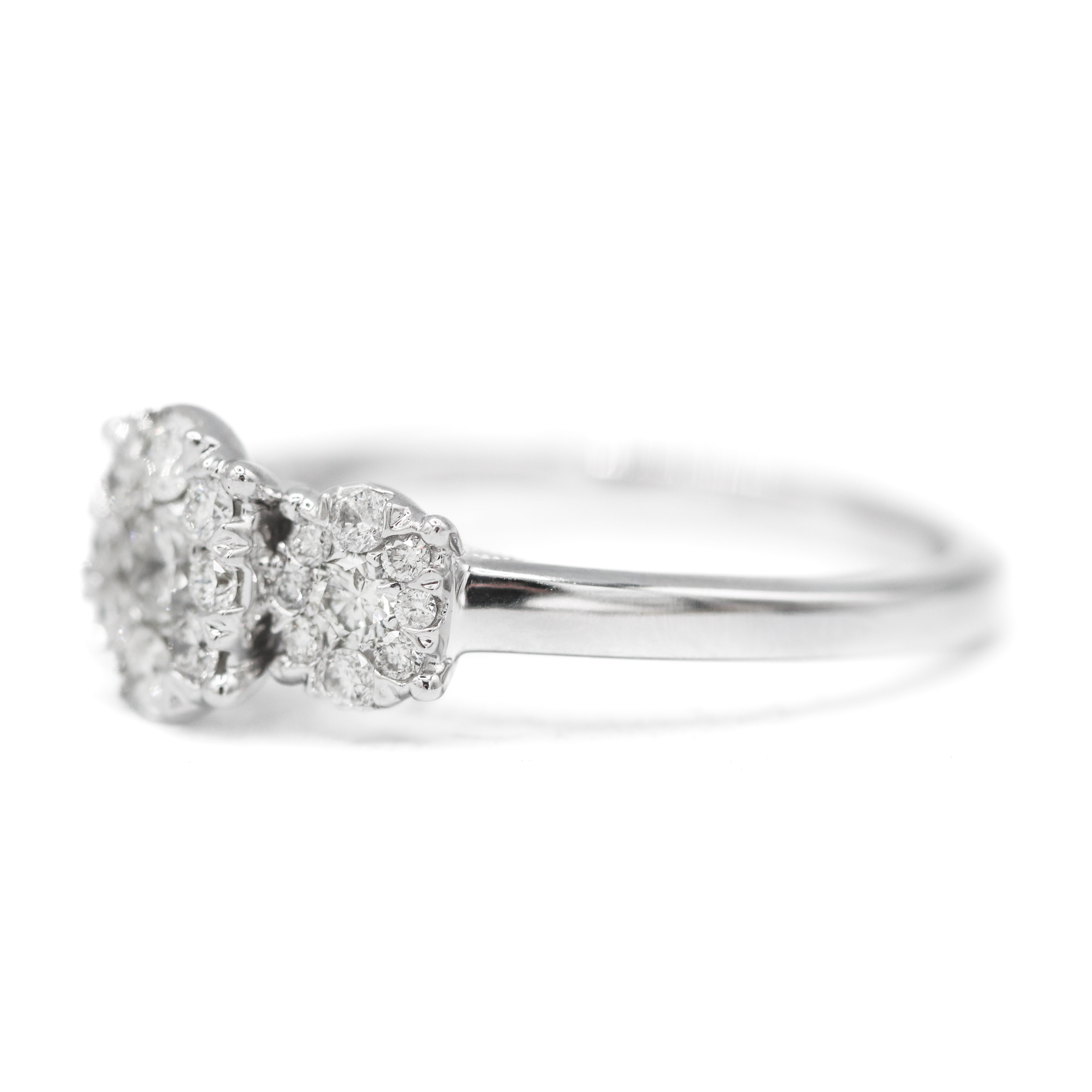 The "Laurie" — 10K White Gold 0.75CTW. Diamond 3-Stone Oval Cluster Halo Engagement Ring