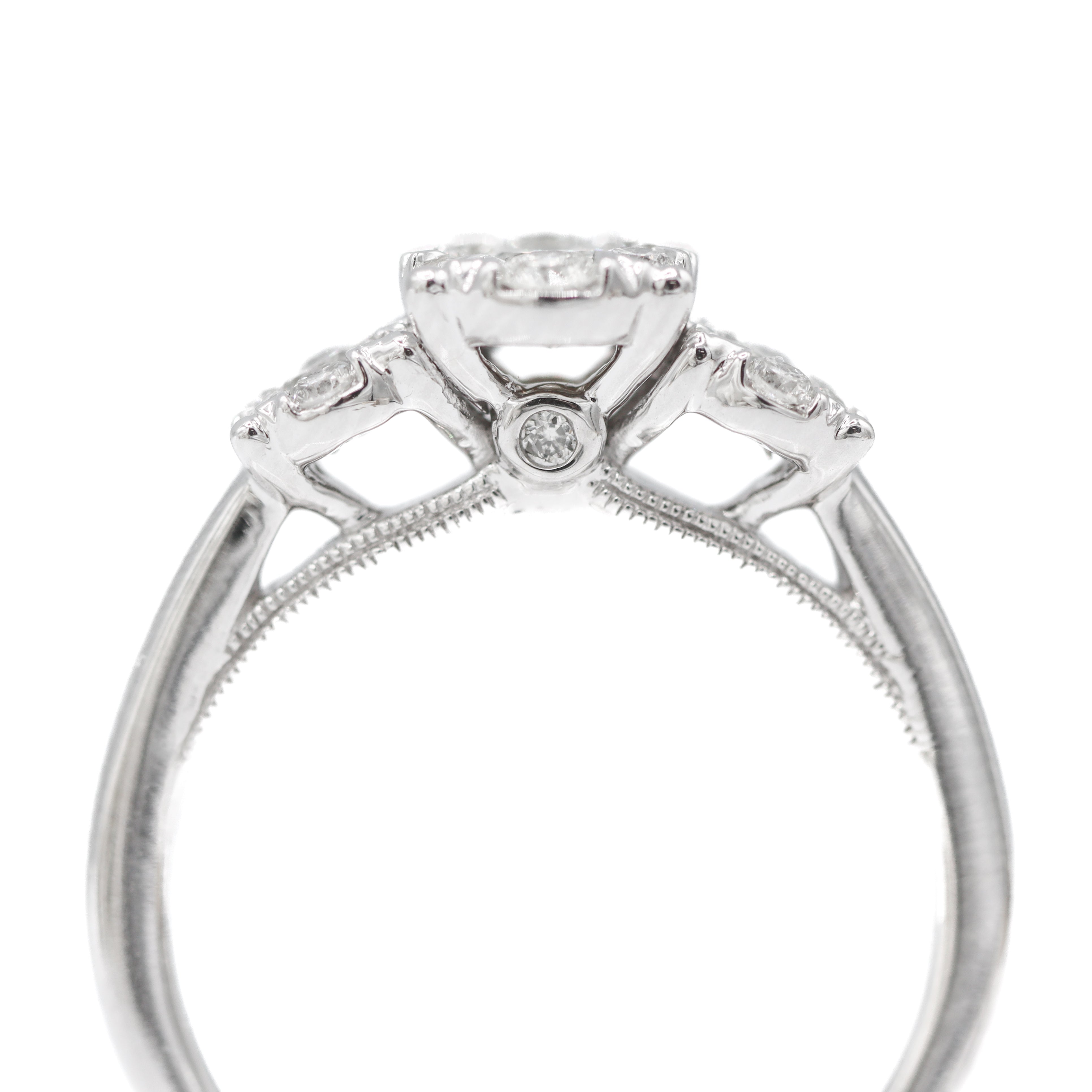 The "Laurie" — 10K White Gold 0.75CTW. Diamond 3-Stone Oval Cluster Halo Engagement Ring