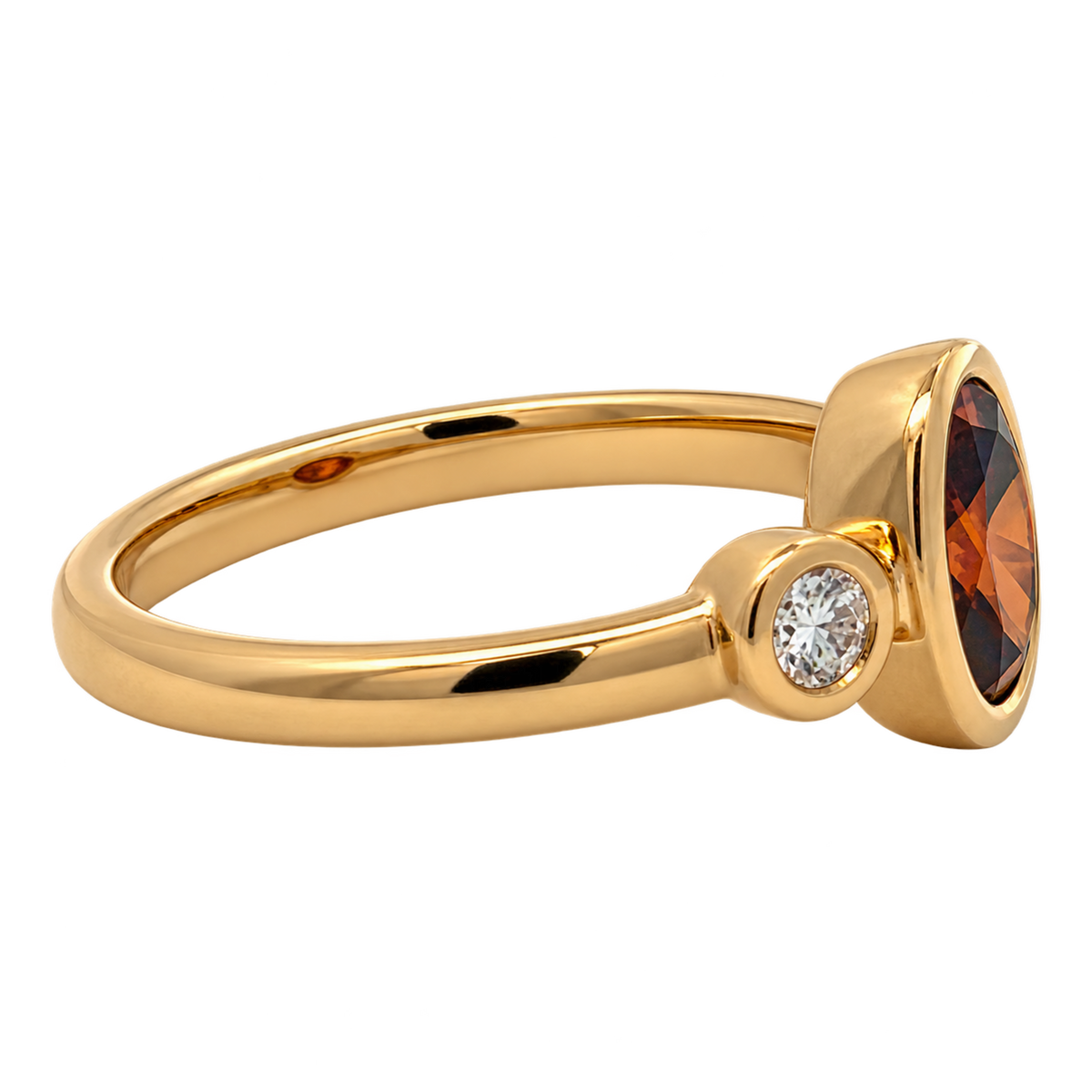 Right side view of RAHVW4-A 14K yellow gold three-stone ring showing the raised oval red lab-grown diamond bezel and round white lab-grown diamond accent.