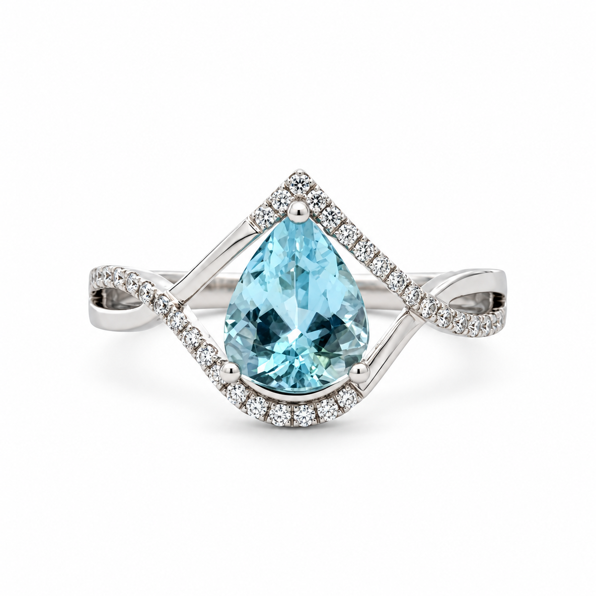 Front view of a 14K white gold pear aquamarine ring with a diamond-accented open geometric frame and twisting shoulders.