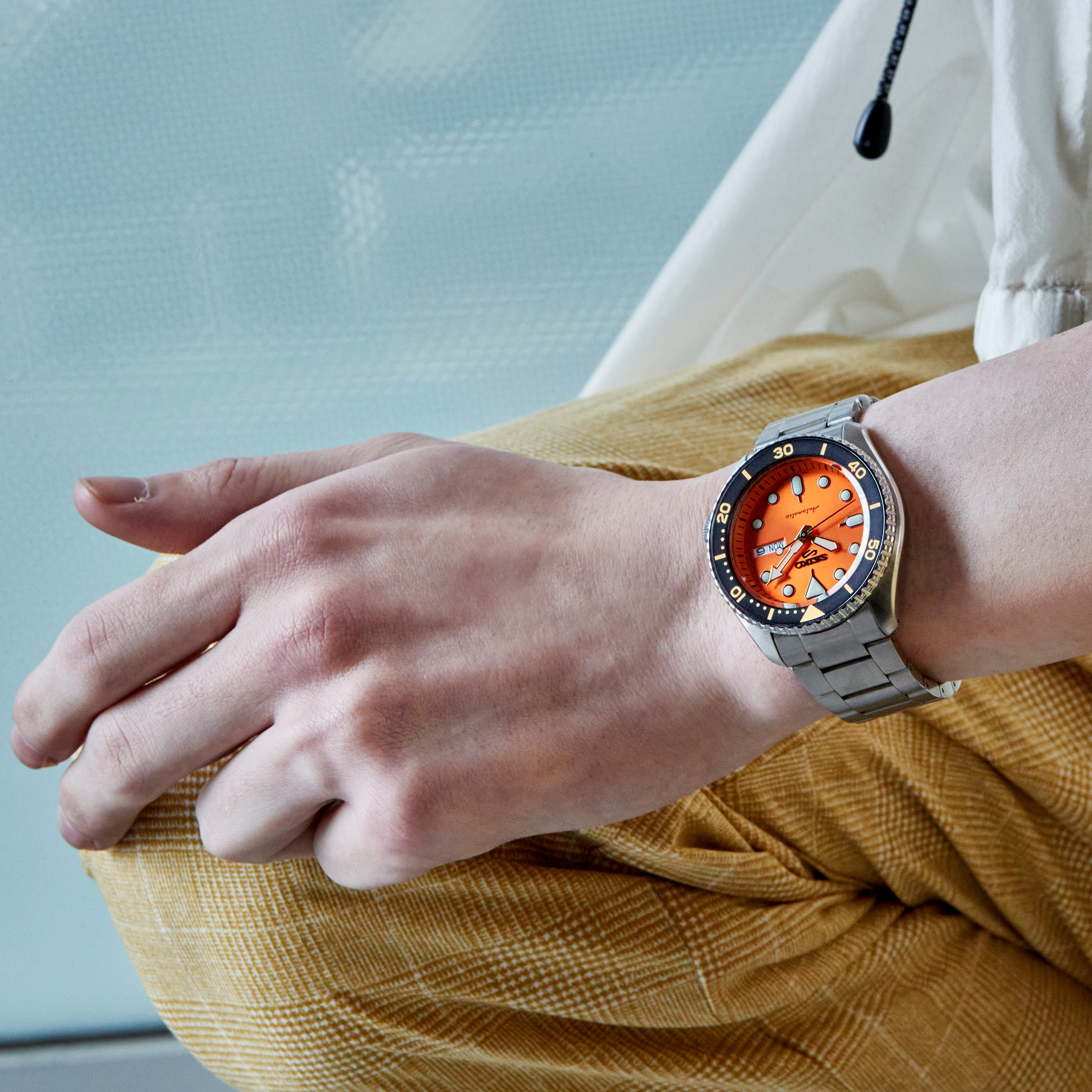 SEIKO 5 SPORTS Men's Automatic Orange-Dial & Black Bezel Watch