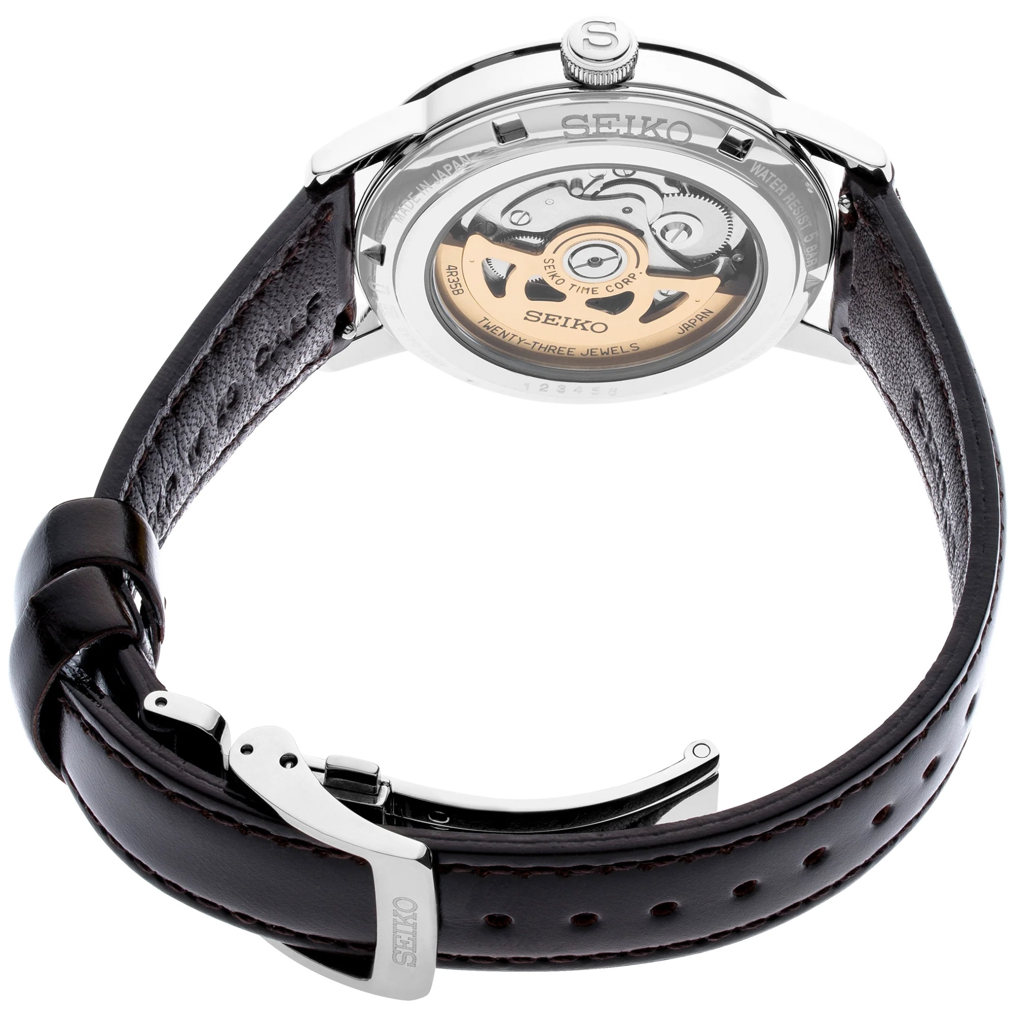 Seiko watch with black leather strap and open face design on a white background