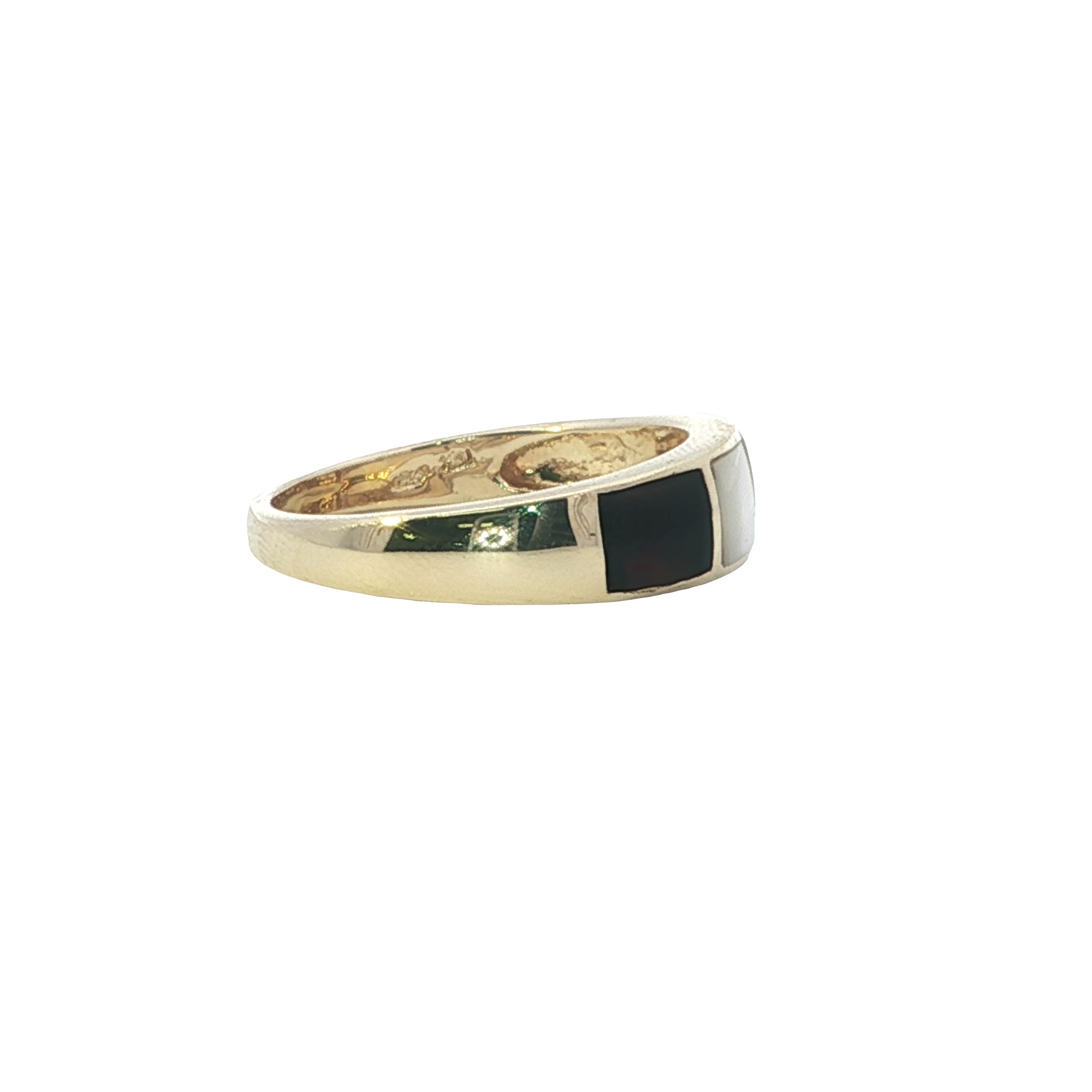 Gold ring with a black stone on a white background