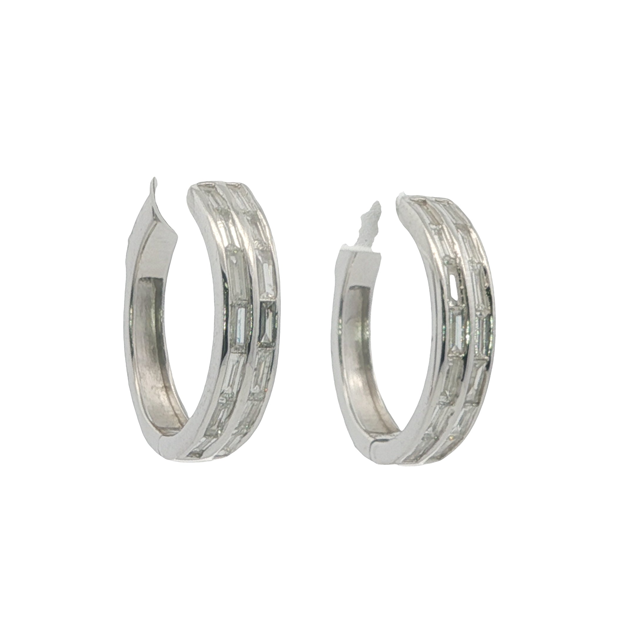 Pair of silver hoop earrings on a white background