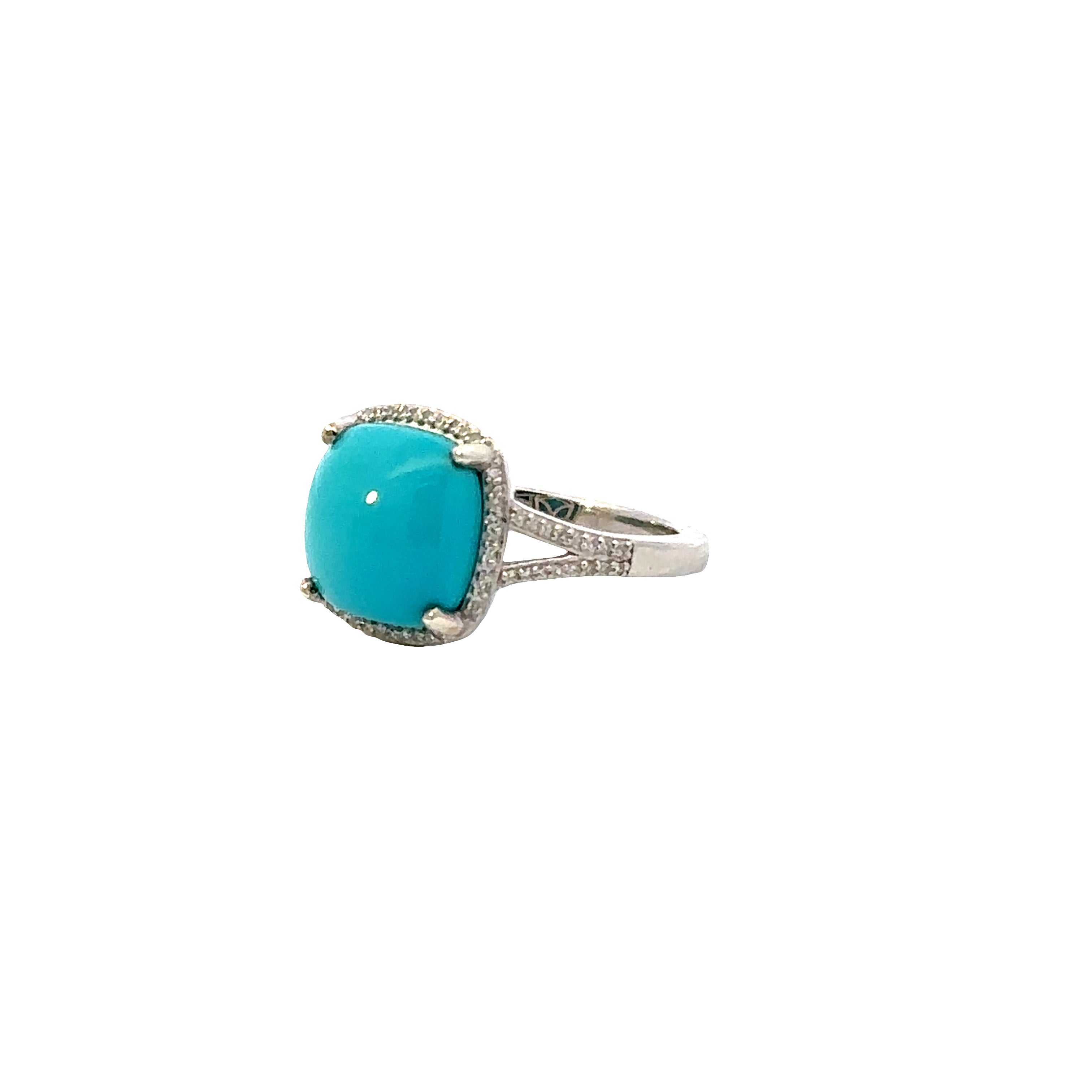 Turquoise ring with silver band on a white background