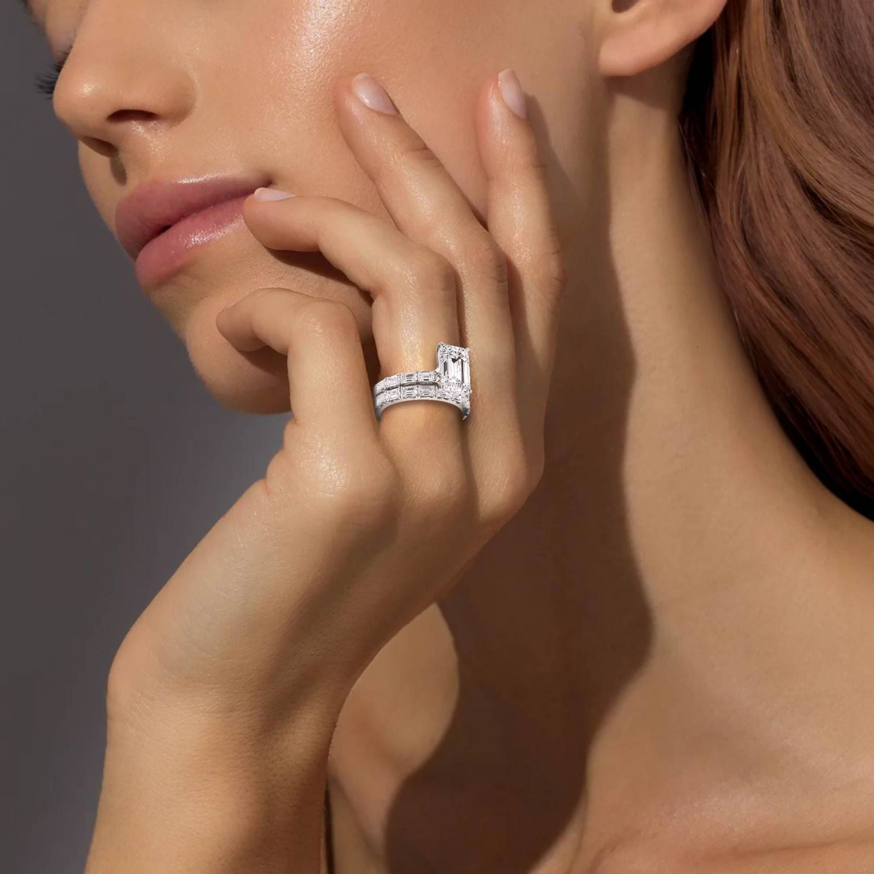 White Gold Lab Grown Diamond engagement ring and wedding band set on a models hand