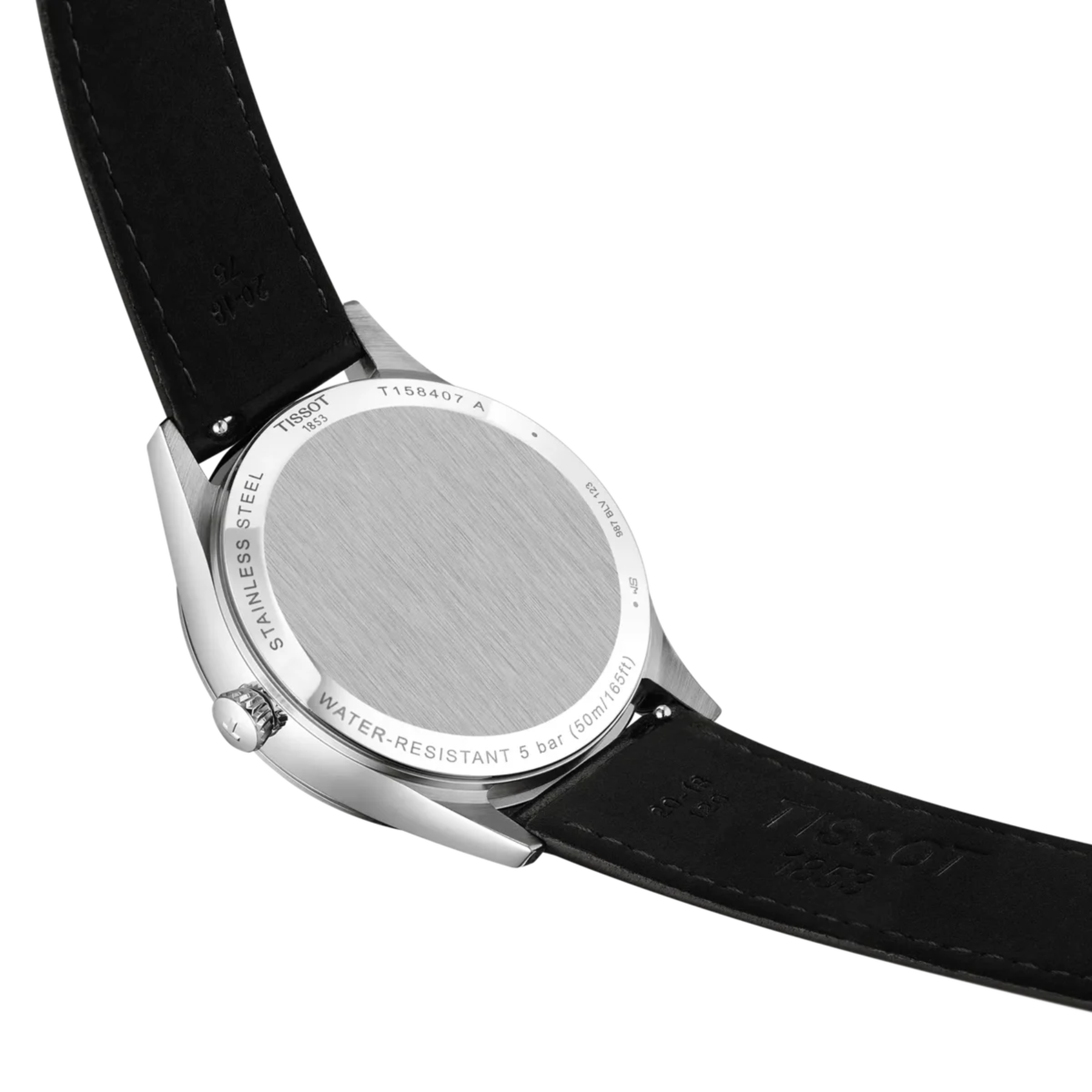 Close-up of a Tissot watch with a black leather strap on a white background