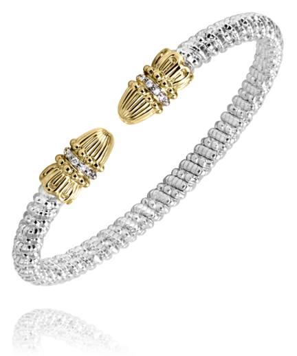 Silver bracelet with gold clasp on a white background