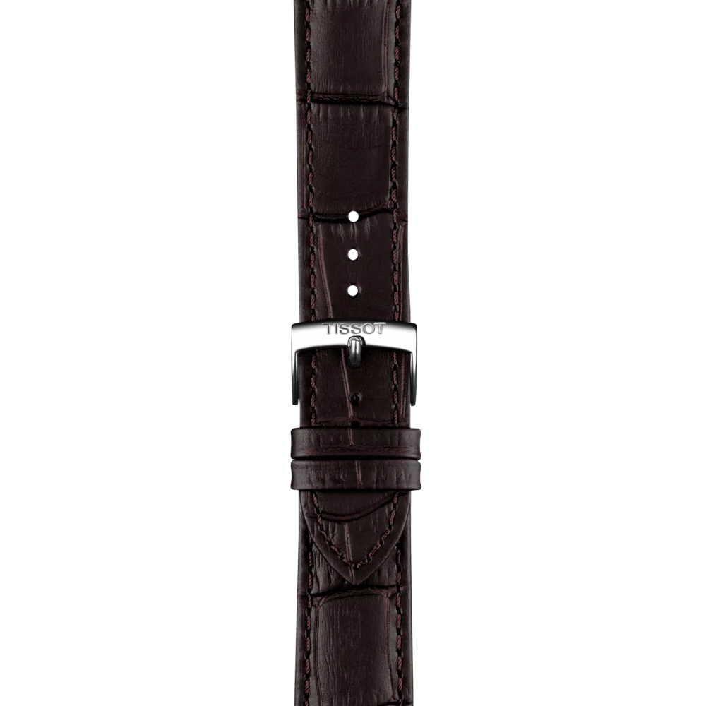 Brown crocodile-patterned watch strap with Tissot logo on a white background