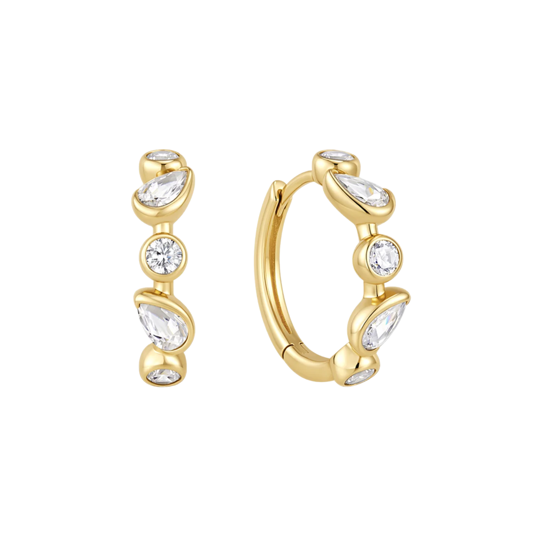 A pair of gold huggie hoop earrings decorated with clear marquise and round gemstones, shown on a plain white background.