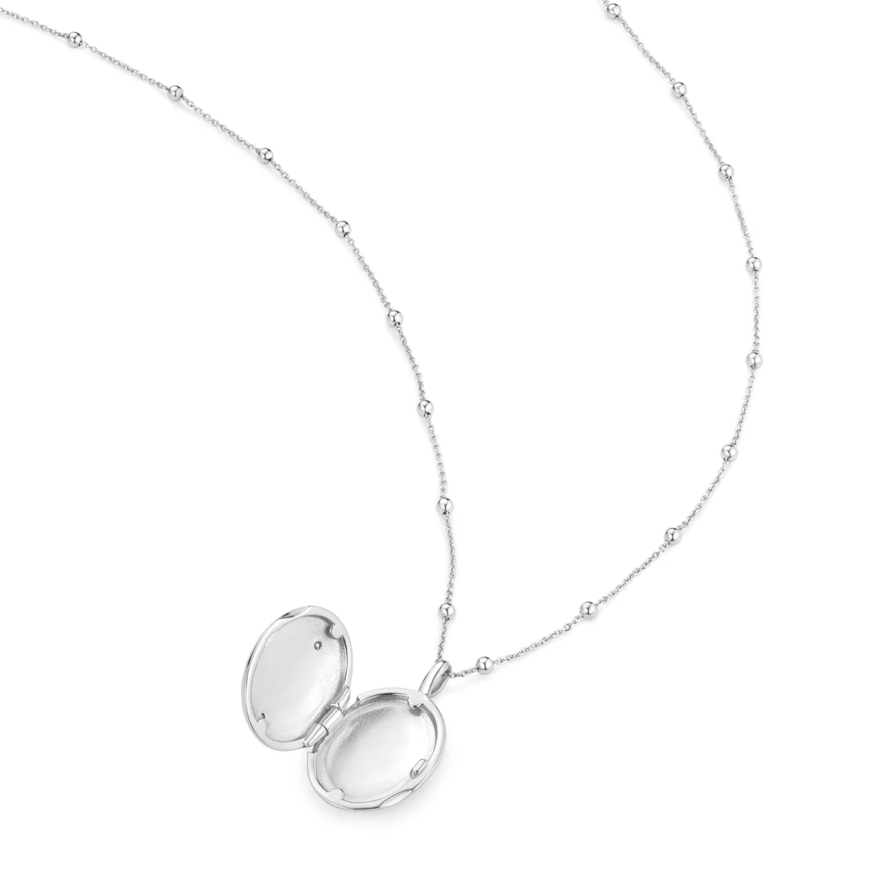 Silver locket necklace on a white background