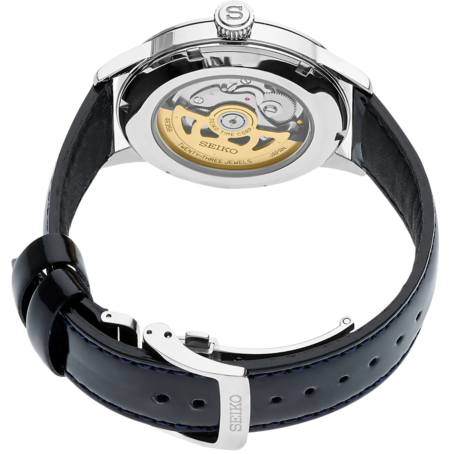 Close-up of a Seiko watch with black strap and visible mechanical components.