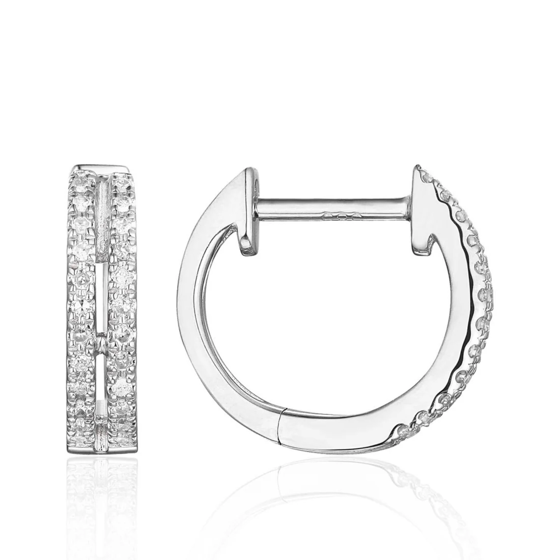 Silver hoop earrings with clear gemstones on a white background