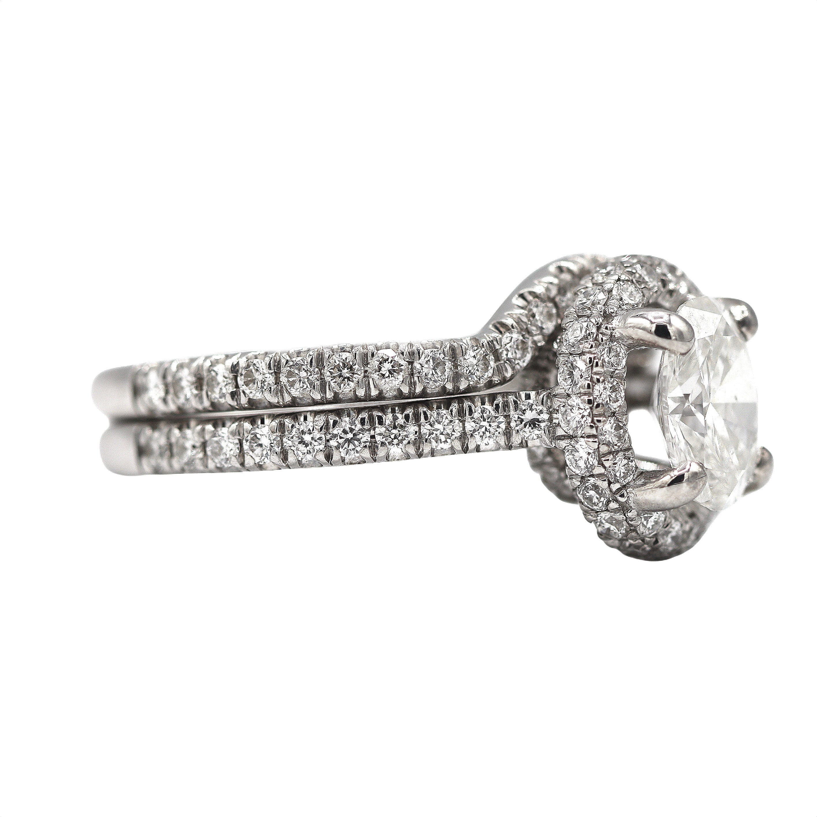 Estate Collection: Gabriel and Co. 14K White Gold 2CTW. Diamond Oval Halo Engagement Ring and Matching Band Set
