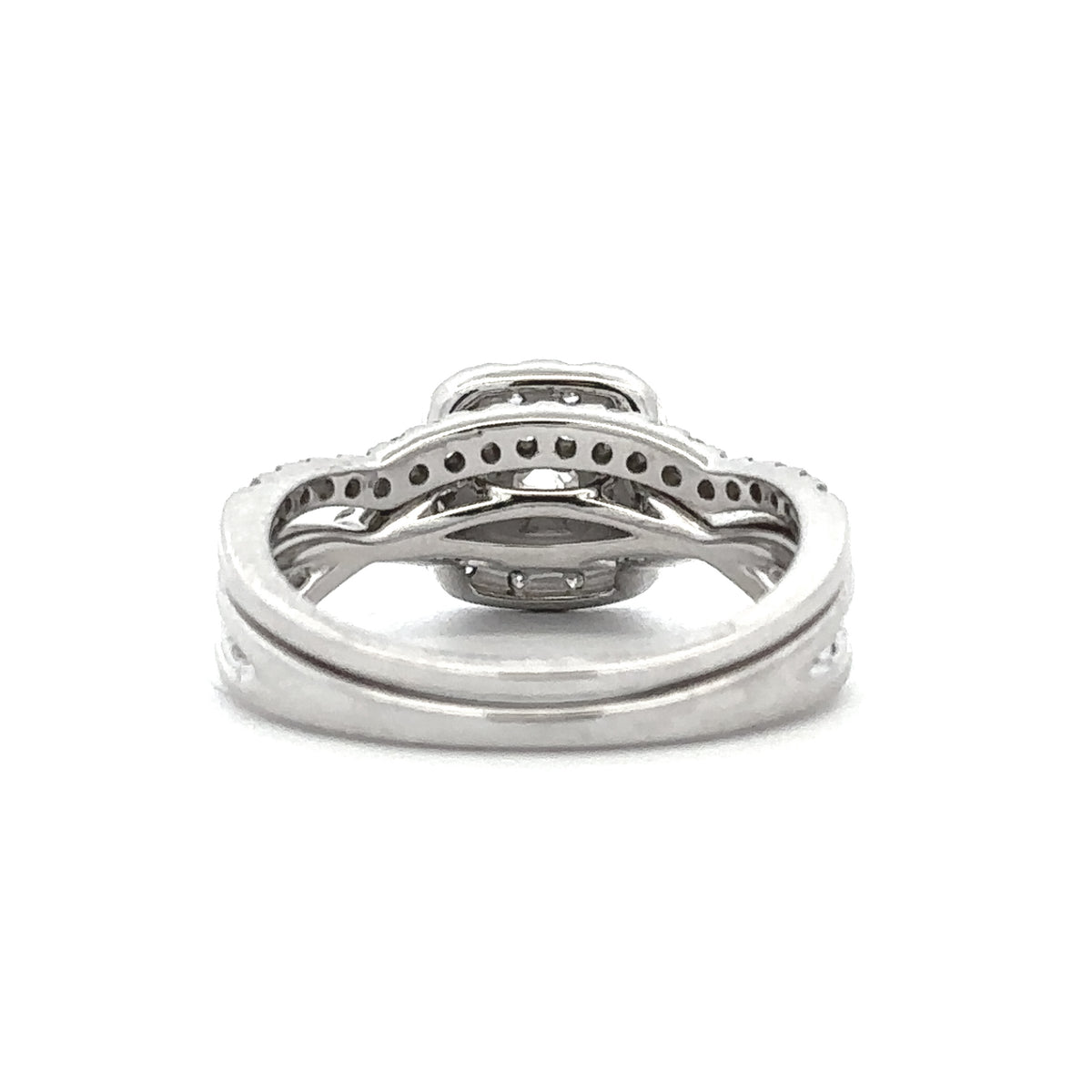 10K White Gold 1.10CTW. Diamond Twisted Shank Halo Engagement Ring and Contoured Wedding Band Set