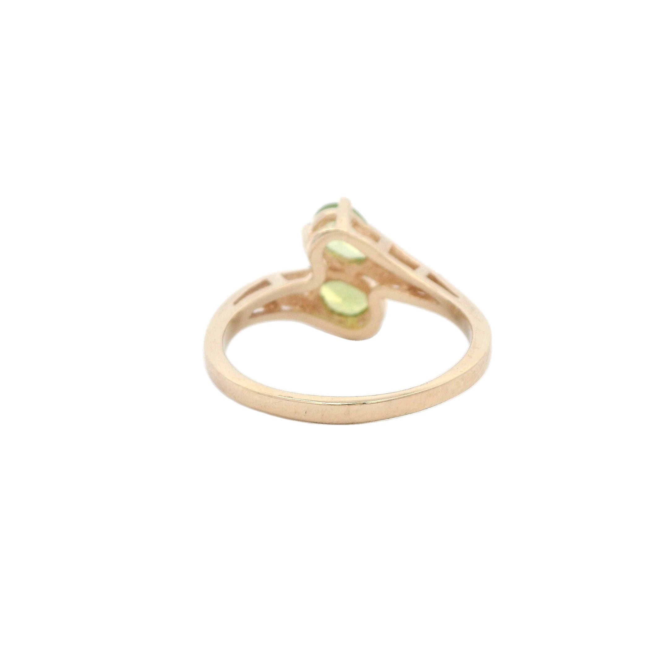 Estate Collection: 14K Yellow Gold 2-Stone Pear-Cut Peridot Bypass Ring