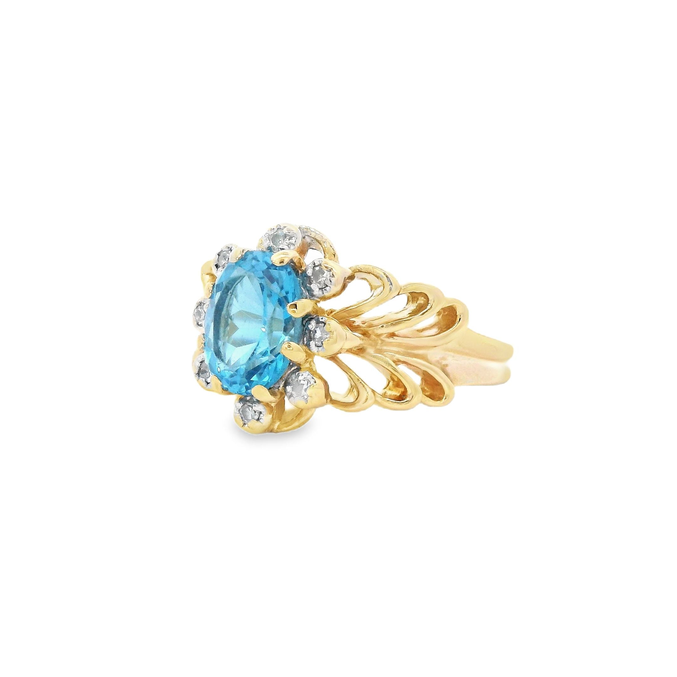 Estate Collection: 10K Yellow Gold Ornate Oval Blue Topaz & Diamond Ring