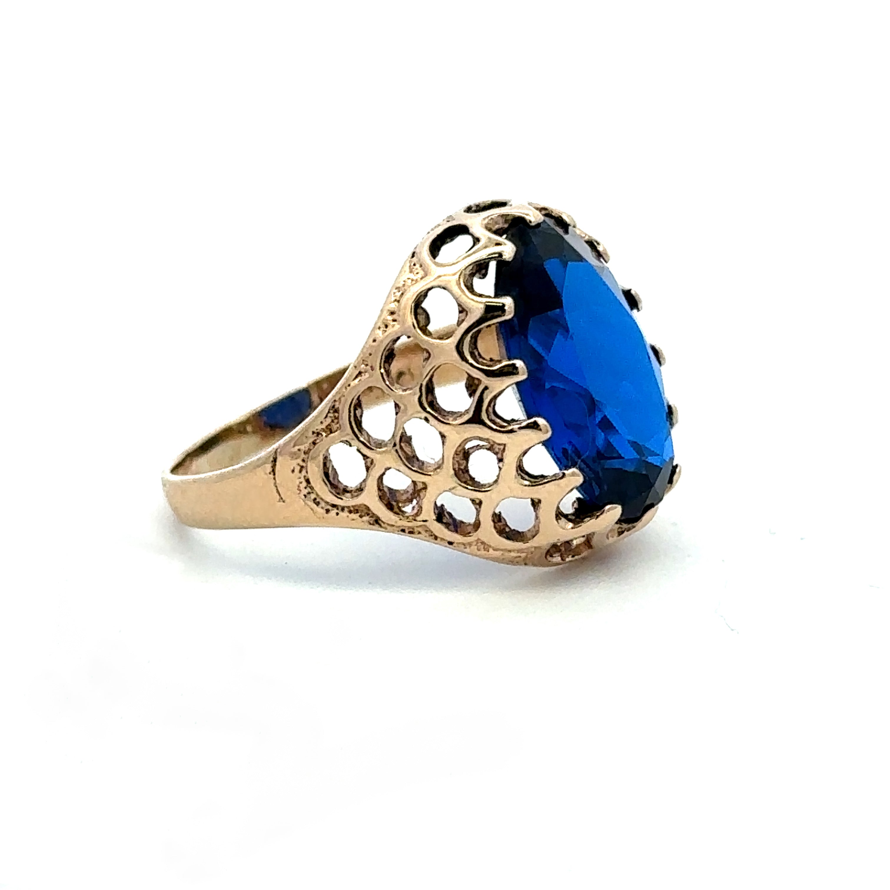 Estate Collection: 10K Yellow Gold Blue Oval Open Pattern Cocktail Ring