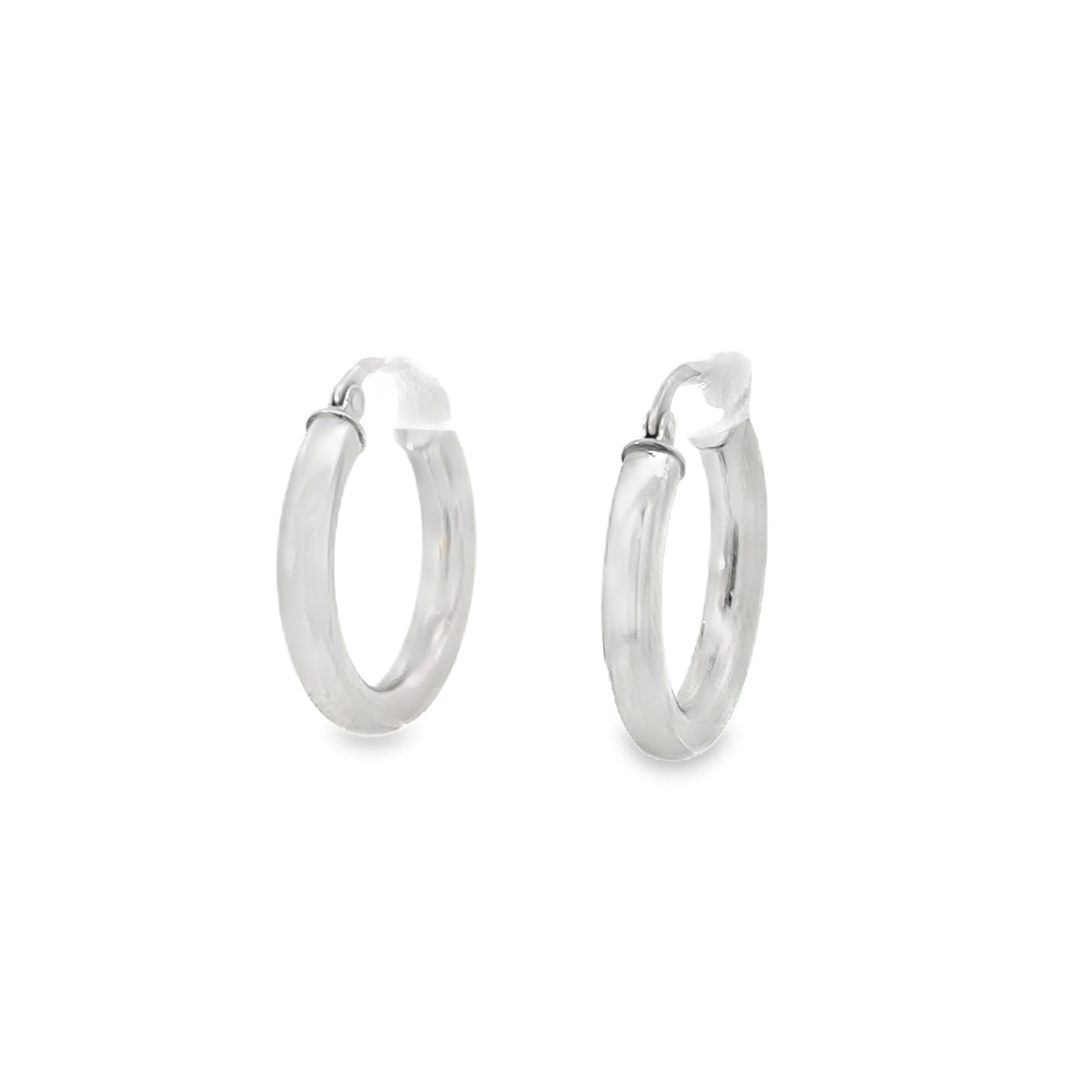 14k silver hoops on white background 