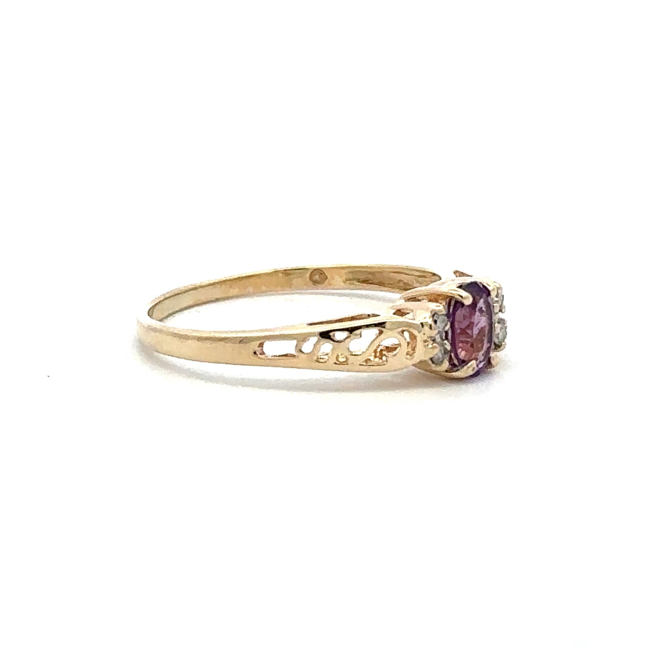 Estate Collection: 10K Yellow Gold Oval Amethyst and Diamond Accented Ring