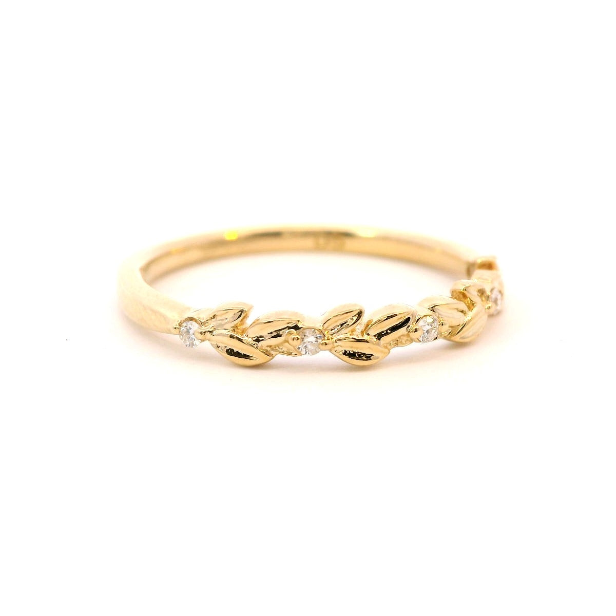 Side view of 14K Yellow Gold 0.05CTW. Diamond Laurel Band on white background.