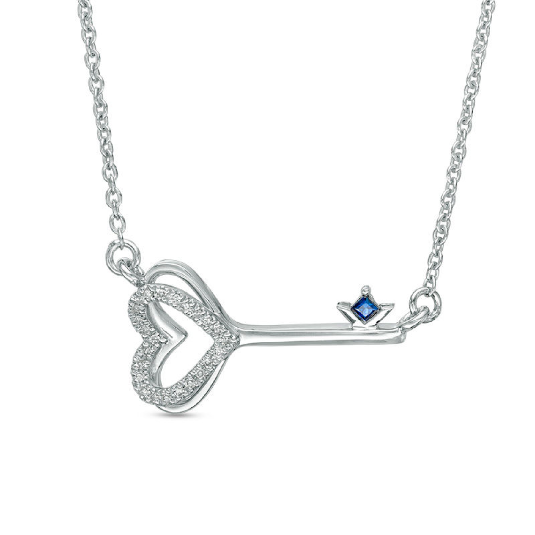 Silver necklace with a heart and blue gemstone pendant on a white background