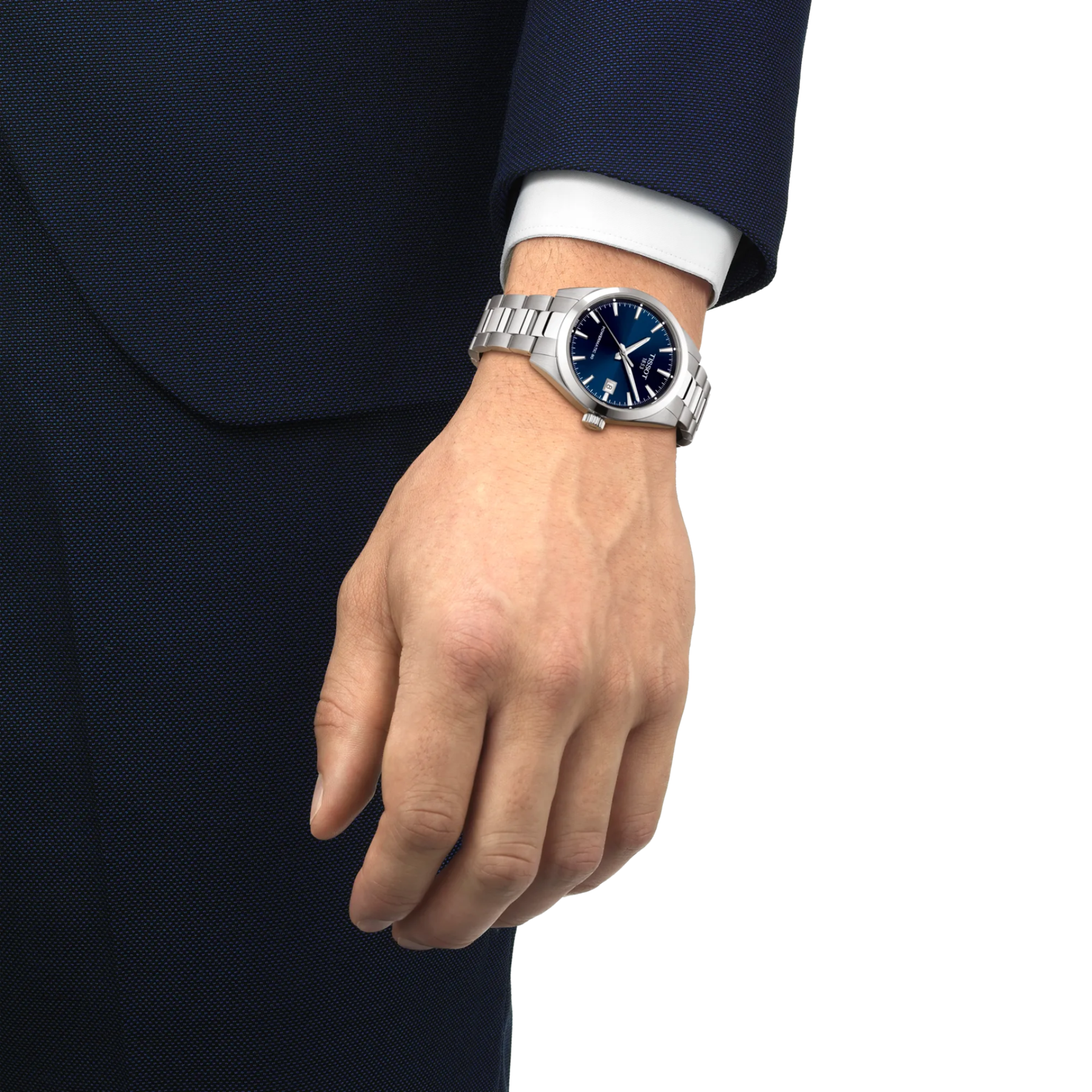Hand wearing a silver watch with a blue face on a white background