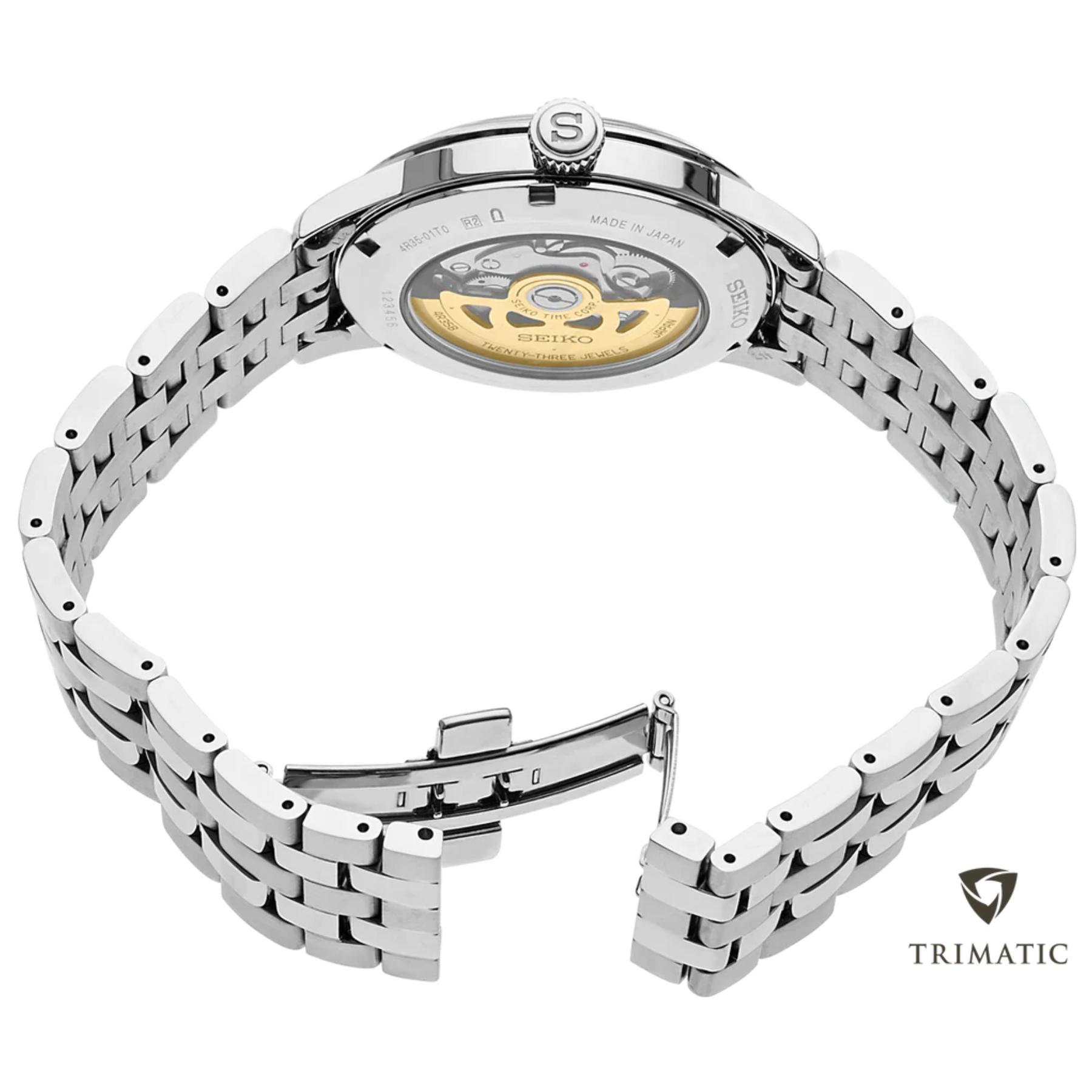 Silver Seiko watch with open face design on a white background