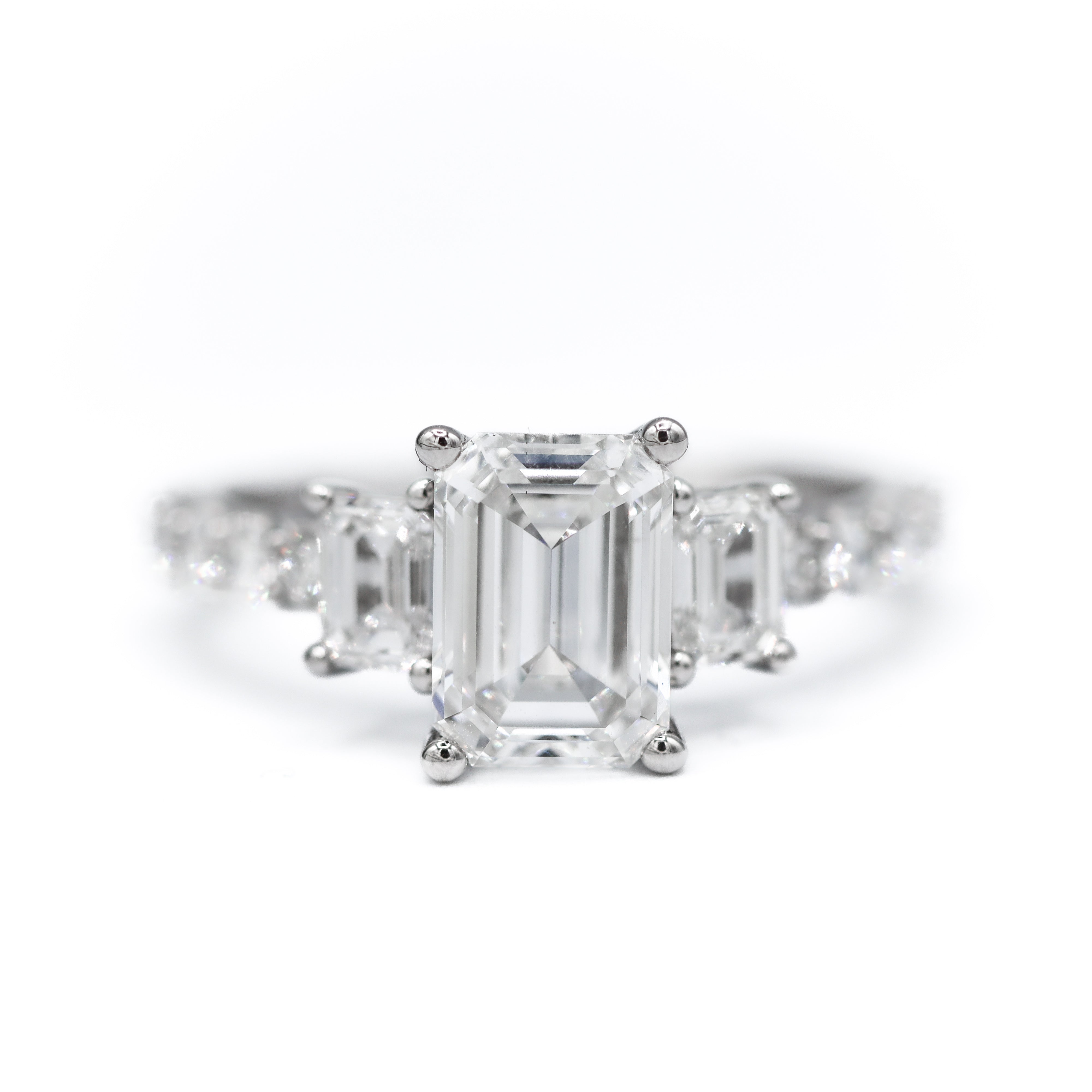 Front View of 14K White Gold 3CTW. Emerald-Cut Lab-Grown Diamond Accented Engagement Ring