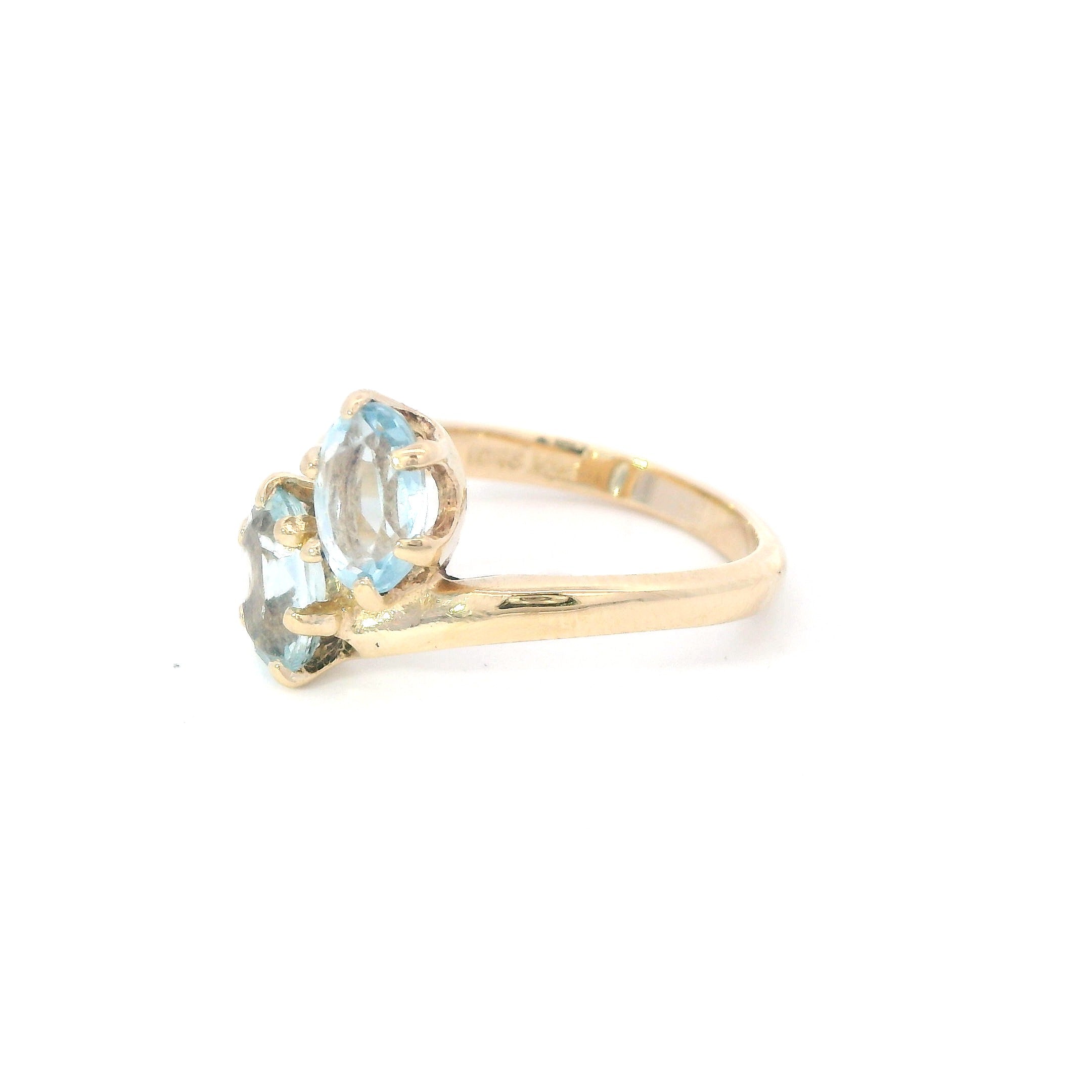 Estate Collection: 14K Yellow Gold 2-Stone Oval Aquamarine Bypass Ring
