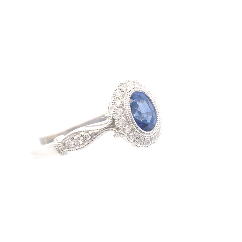 14K White Gold Vintage-Inspired Oval Sapphire and 1/6CT. Diamond Ring