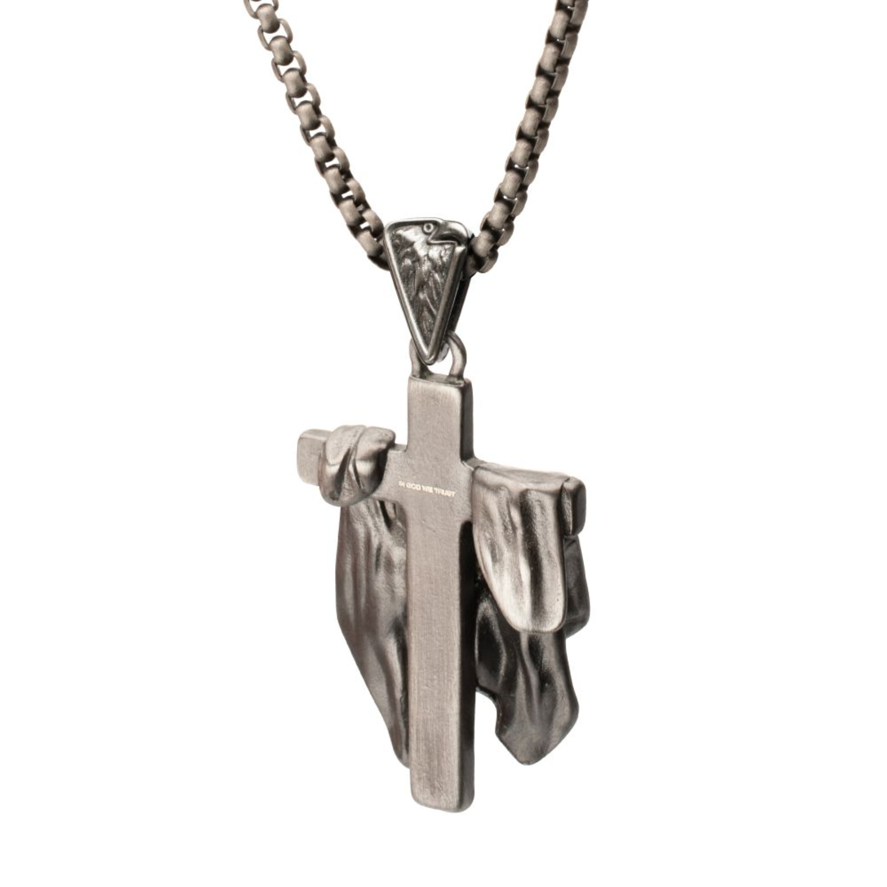 Silver cross pendant necklace on a white background