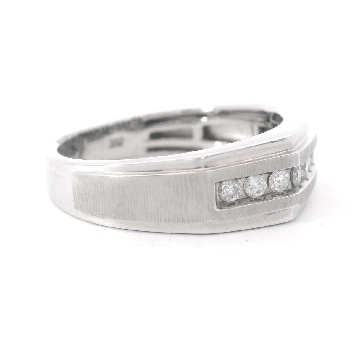 Angled to the side view of 10K White Gold 1/3CT. Diamond Men's Geometric Channel-Set Wedding Band laying flat on a white background.