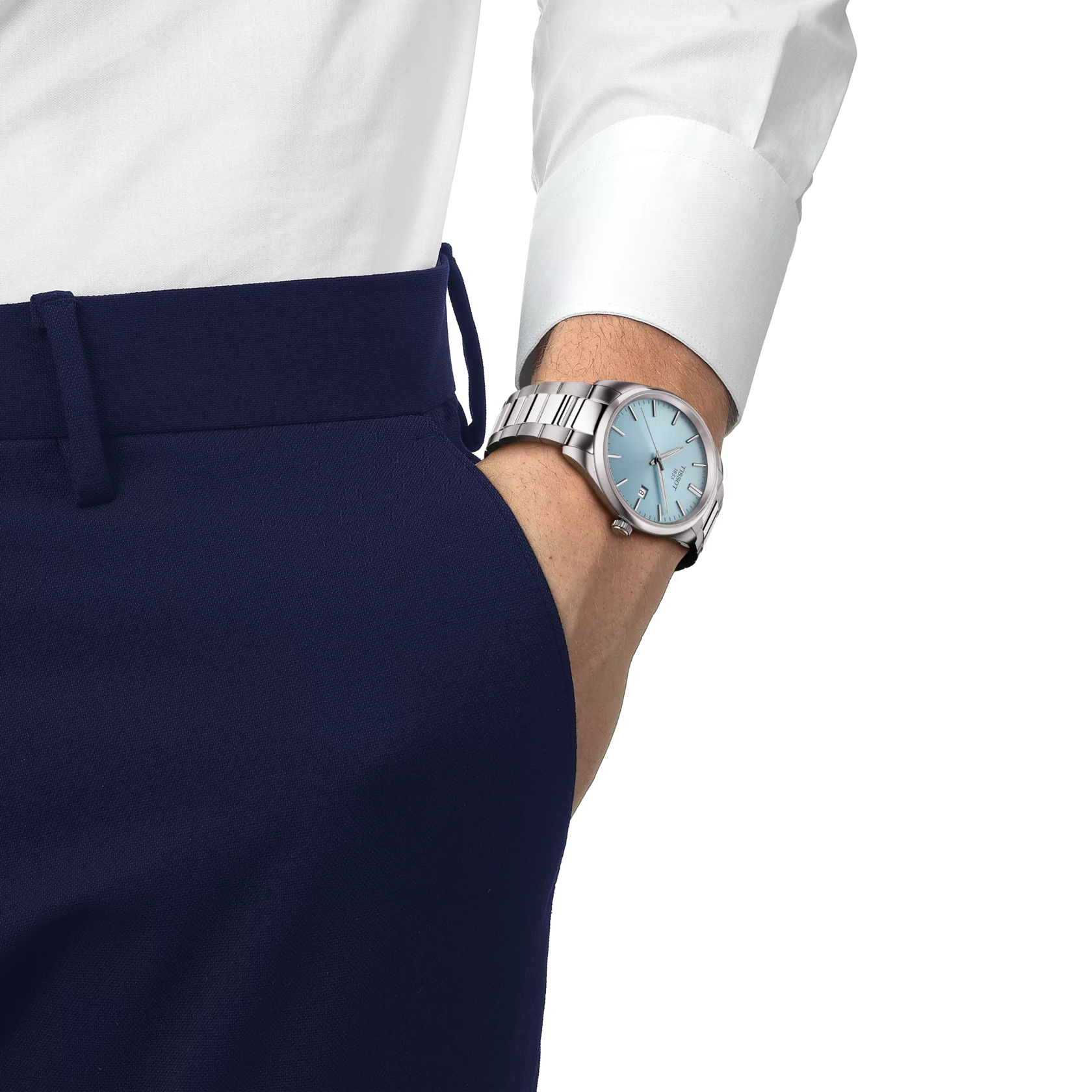 Person wearing a silver watch with a blue face on a white background